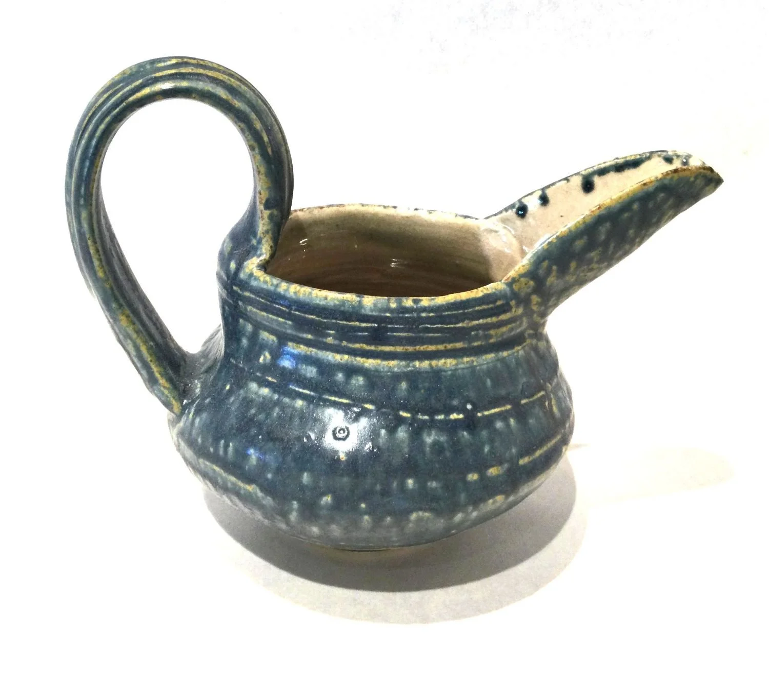 Reduction Gravy Boat (#25.7.6), 2025, reduction fired porcelain, 6.5 x 8 x 5.25 inches (16.5 x 20.5 x 13.5 cm) $80 Cdn.