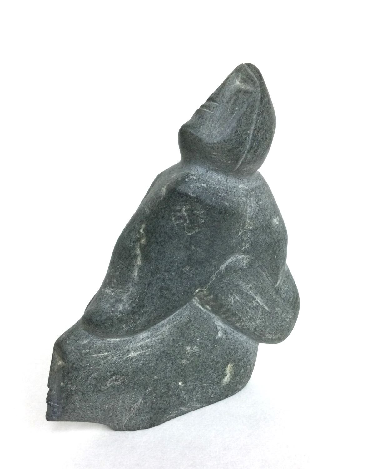 Joy Kiluvigyuak Hallauk E1-366 (1940-2000) Arviat/Eskimo Point ᐊᕐᕕᐊᑦ, Mother And Child, n.d., basalt/serpentine, 8 x 2 x 7 inches (20 x 5 x 17.5), provenance: private collection BC, $1500 Cdn.