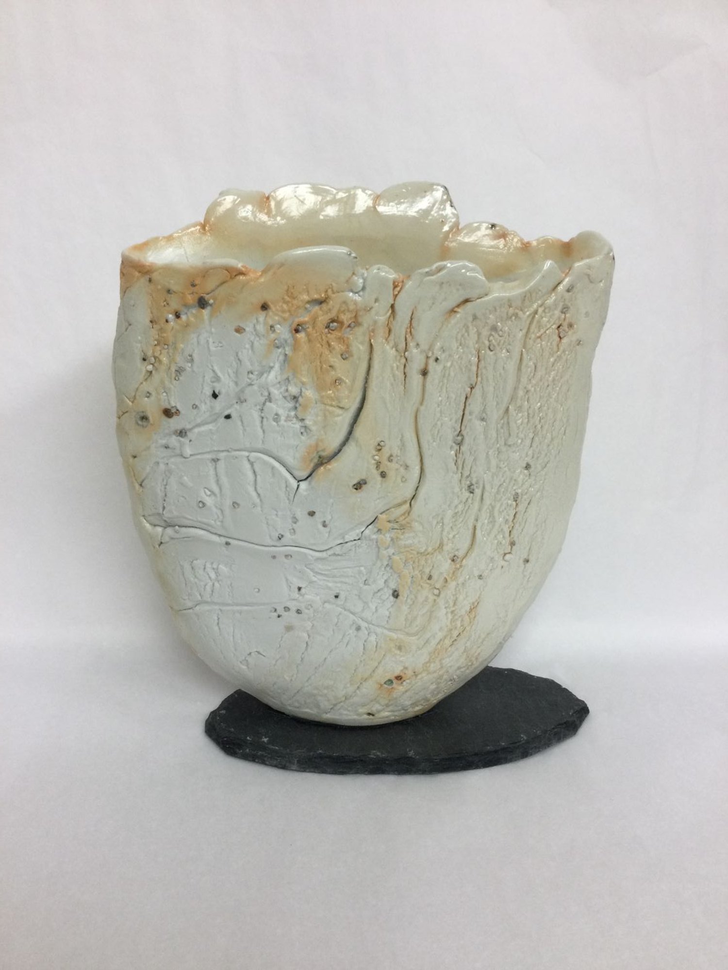 Vase/Object XXV-IV, 2025, porcelain slab with slate base, studded with inclusions of natural materials, wood-fired, 8.5 x 6 x 2" (21 x 15 x 5 cm), sold