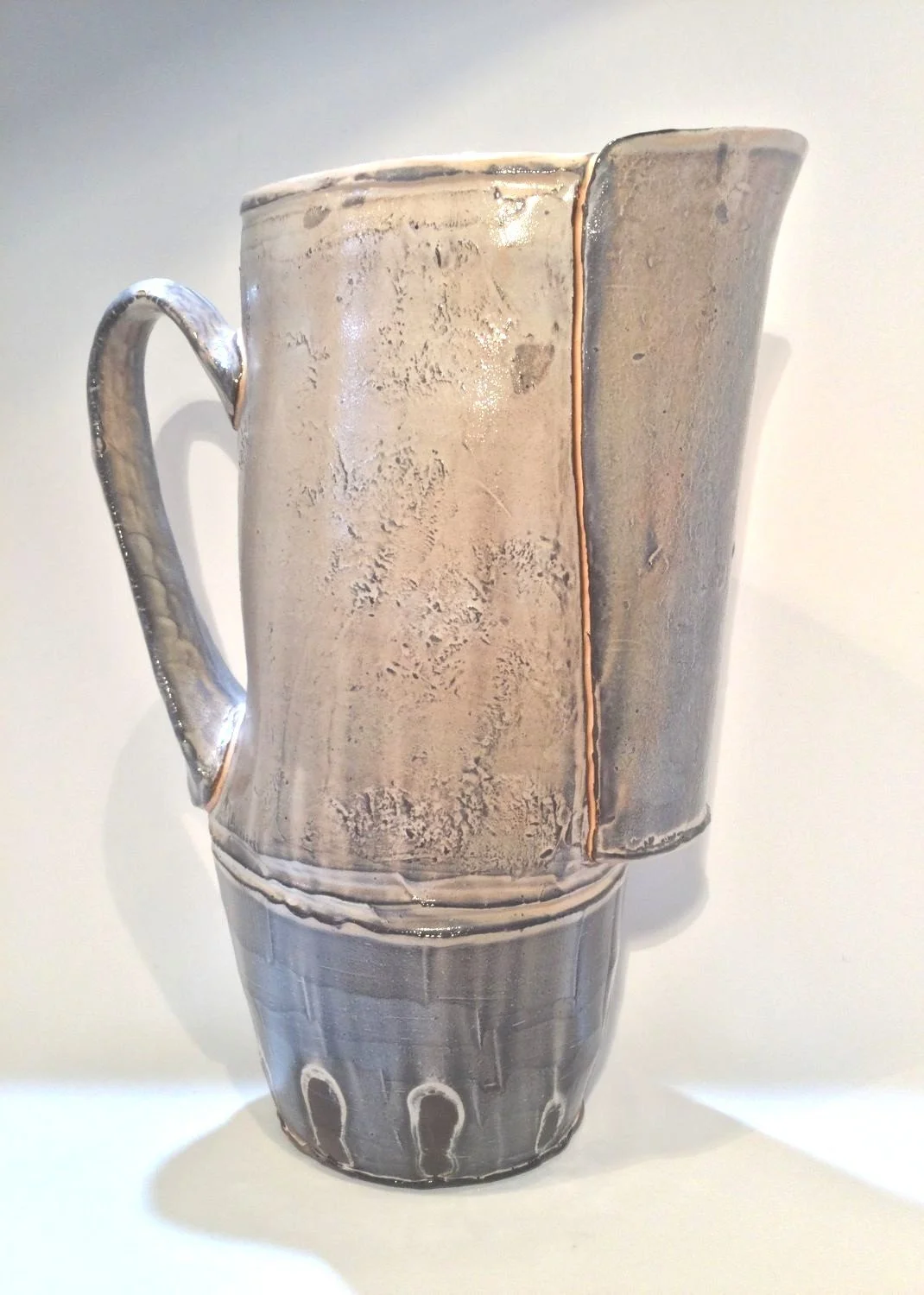 Confluence Pitcher (#26.2.3), 2026, low soda fired earthenware, 9.75 x 4 x 7.5 inches (25 x 10 x 19 cm), $280 Cdn.