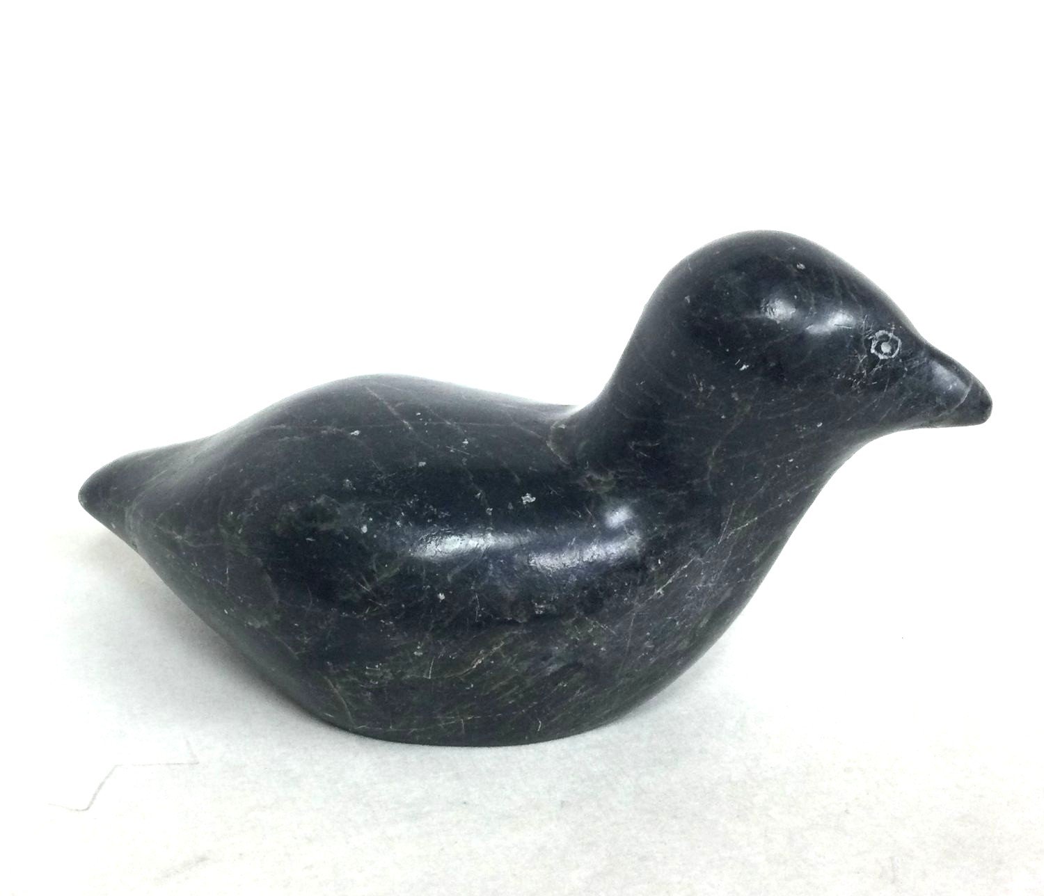 Annie Niviaxie, ᐊᓂ ᓂᕕᐊᓯ E9-1710 (1930-89) Inukjuak/Port Harrison, ᐃᓄᒃᔪᐊᒃ , Water Bird (#26.1.8), c.1970s, serpentine, 2.75 x 6 x 2.75 inches (7x15x7 cm), provenance: private collection BC, $550 Cdn.