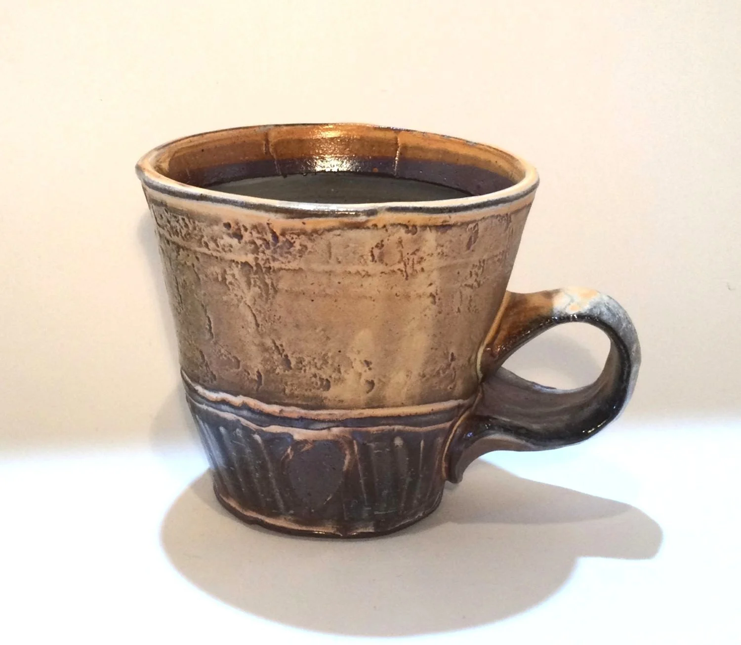 Confluence - Espresso Mug (#26.2.67), 2026, low soda-fired earthenware, 3.25 x 4.25 x 3.25 inches (8.5 x 11 x 8 cm), $60 Cdn.