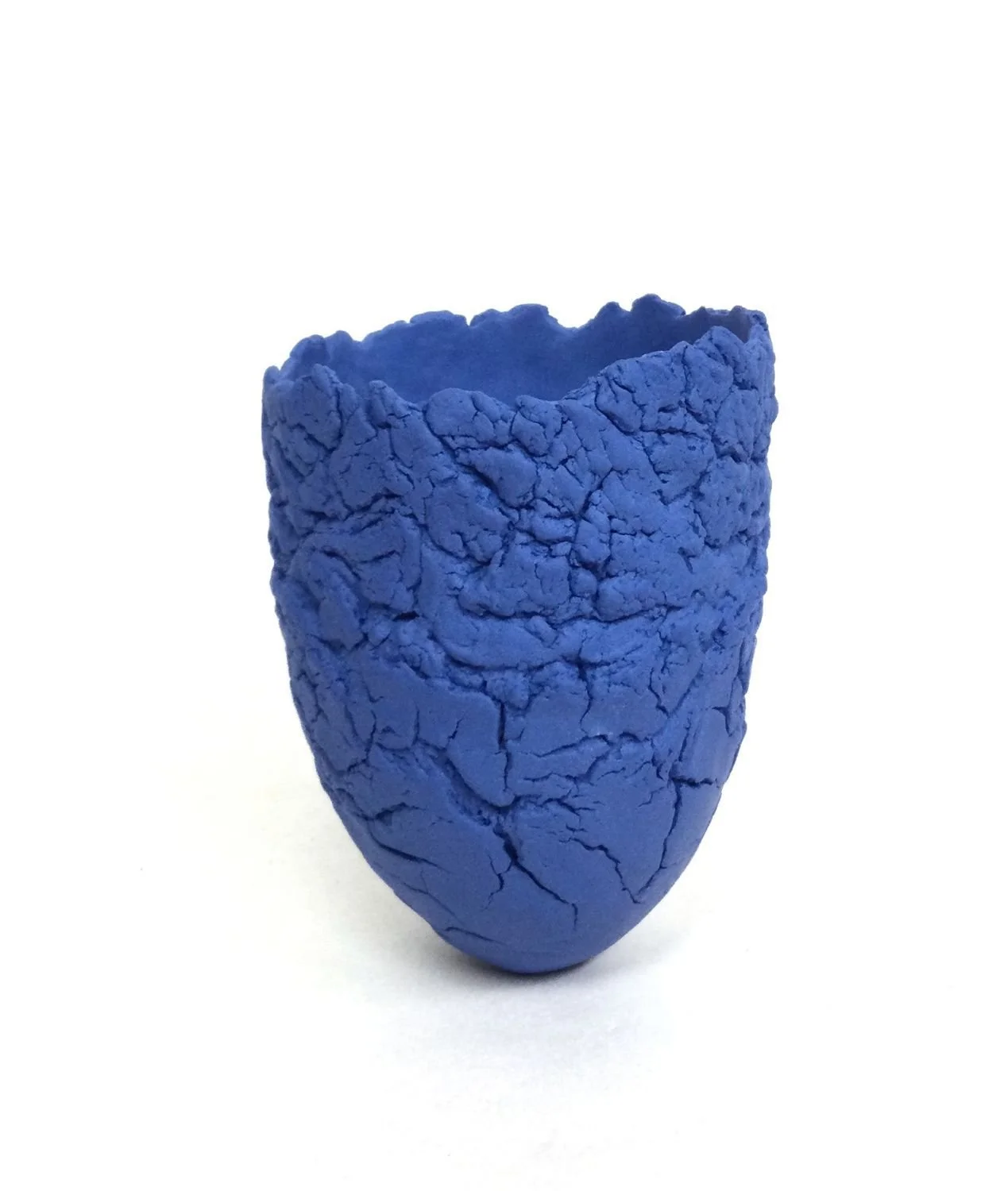 Holding Blue Vessel (#25.8.11), 2025, pinched porcelain, highly textured, unglazed, 5 x 3.75 inches (12.6 x 9.3 cm), $325 Cdn.