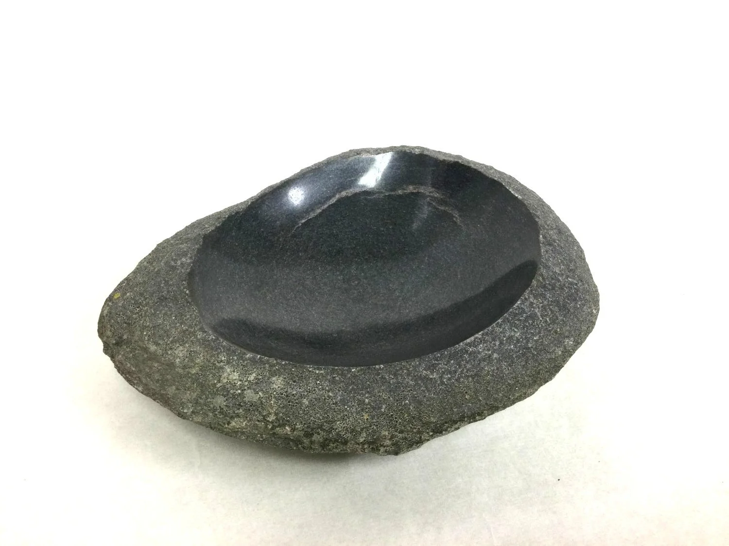 Fieldstone Bowl (#25.37), 2025, found rock, bored, polished, 3 x 9.5 x 7 inches (7.5 x 24 x 17.5 cm), $295 Cdn.
