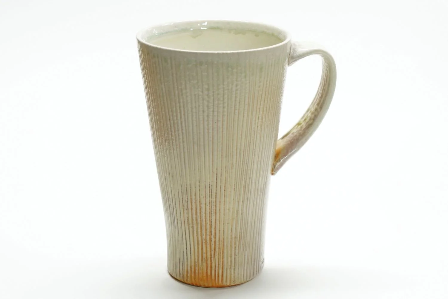 Tall Striped Mug (#25.58), soda fired porcelain, 6.25 x 5 x 3.75 inches (16 x 13 x 9.5cm), sold