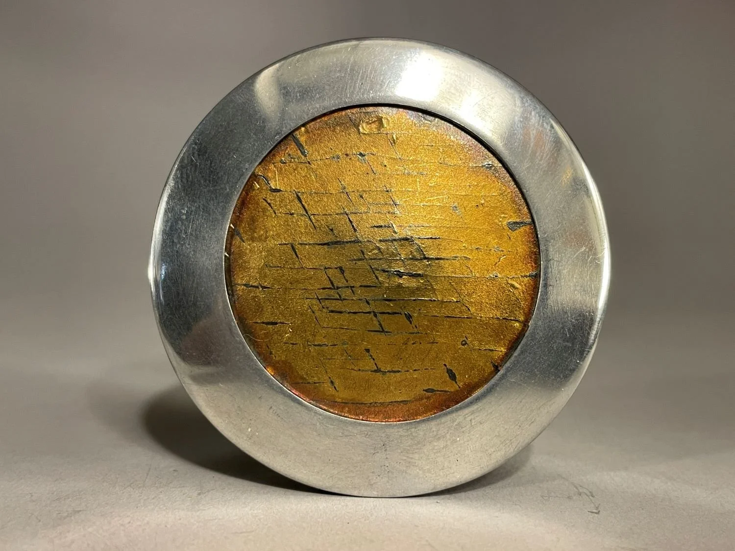 ‘Arctic Ground' Brooch (Swoop Series), 1982, materials 24k gold doublée, sterling, 24k Bezels, (5.7x5.7x0.5 cm), $1400 Cdn.