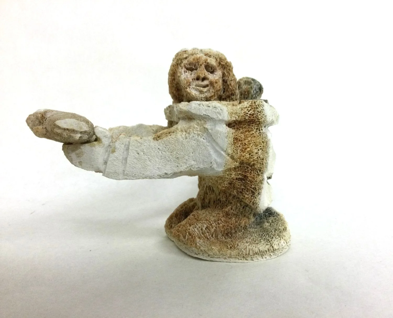 Goota Ashoona (E7-2413) 1967- Cape Dorset/Kinngait, ᑭᙵᐃᑦ, Catch of The Day (#25.8.1), 2001, carved whalebone, 4x5x3 inches (10 x 12.5 x 7.5 cm), provenance: Canmore collection, $695 Cdn.---- note - export restrictions may apply.