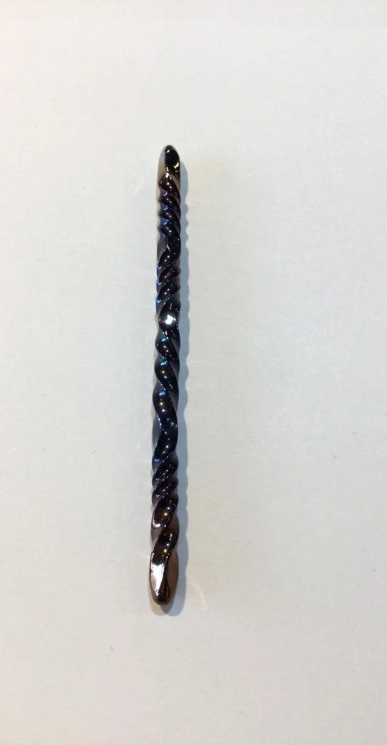 Quantum Wave Tie Pin (#0127F), 2025, steel, magnetic device, 3 x 0.15 x 0.15''/7.7 x 0.5 x 0.5cm (Including magnet: 3x0.5x0.25'' 7.7x1.5x1cm) (just magnet: 1.75x0.5'' 4.5x1.5cm), $200 Cdn....Note: The pin is secured by a magnet concealed behind the f