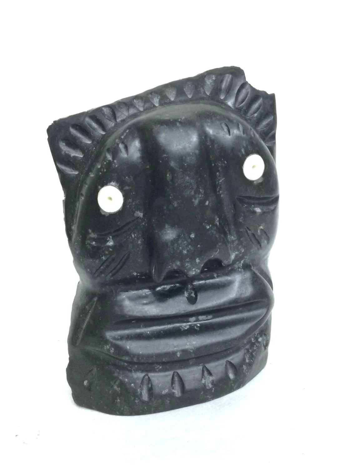 Leo Uttaq (1964-2022) Taloyoak / Spence Bay ᑕᓗᕐᔪᐊᖅ, Spirit Face (#25.8.9), mid-1990s, basalt, antler, 7.75 x 5.5 x 3.5 inches (20 x 13.5 x 10cm), provenance: private collection Canmore, $1500 Cdn