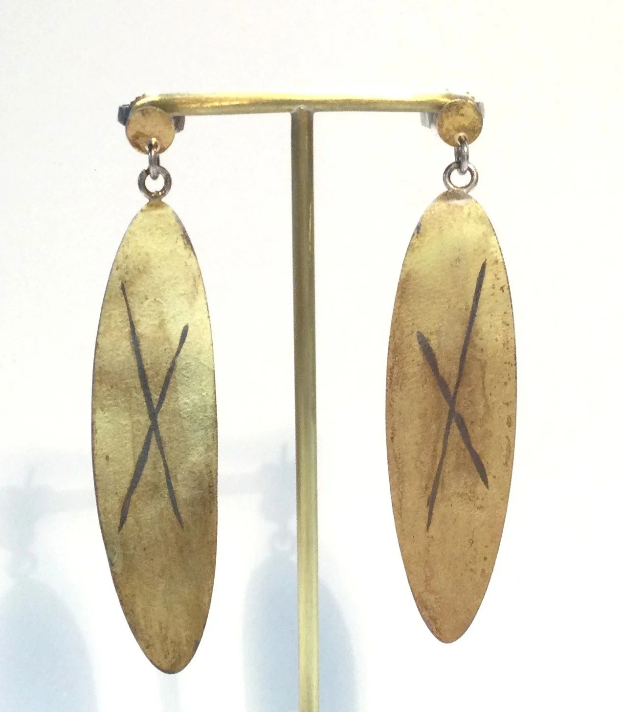 XearringsA (#274), 1980s, doublee, 18 K gold, sterling silver, 2 x .5 inches (5 x 1.5 cm), $180 Cdn.