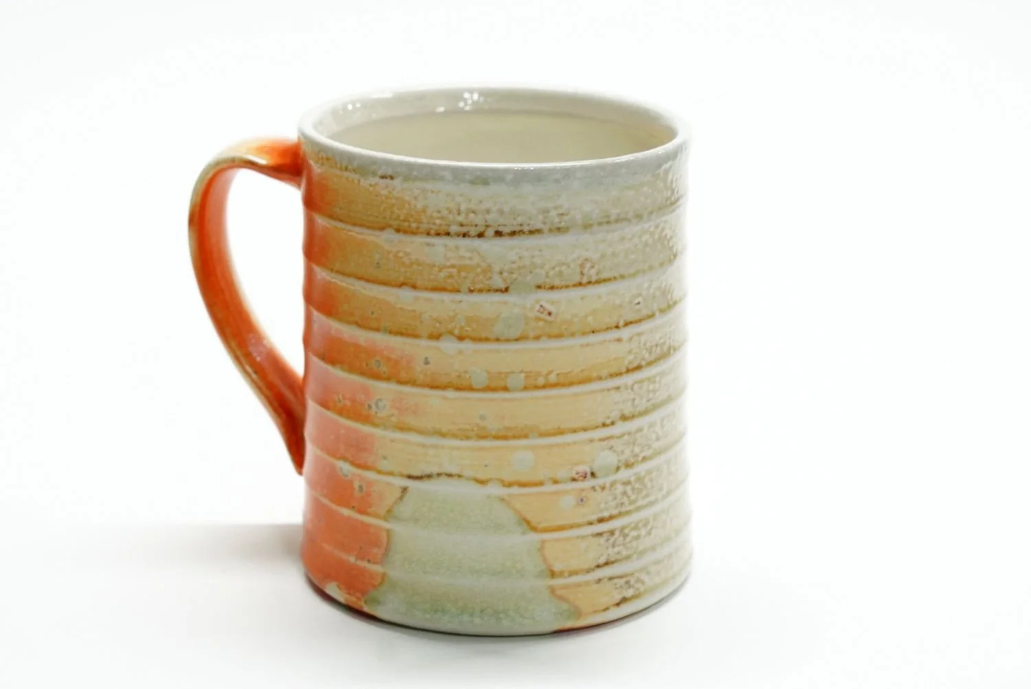 BeeHive Mug (#25.44), 2025, soda fired porcelain, 4.25 x 5 x 3.75" (10.5 x 12.5 x 8.5cm) sold