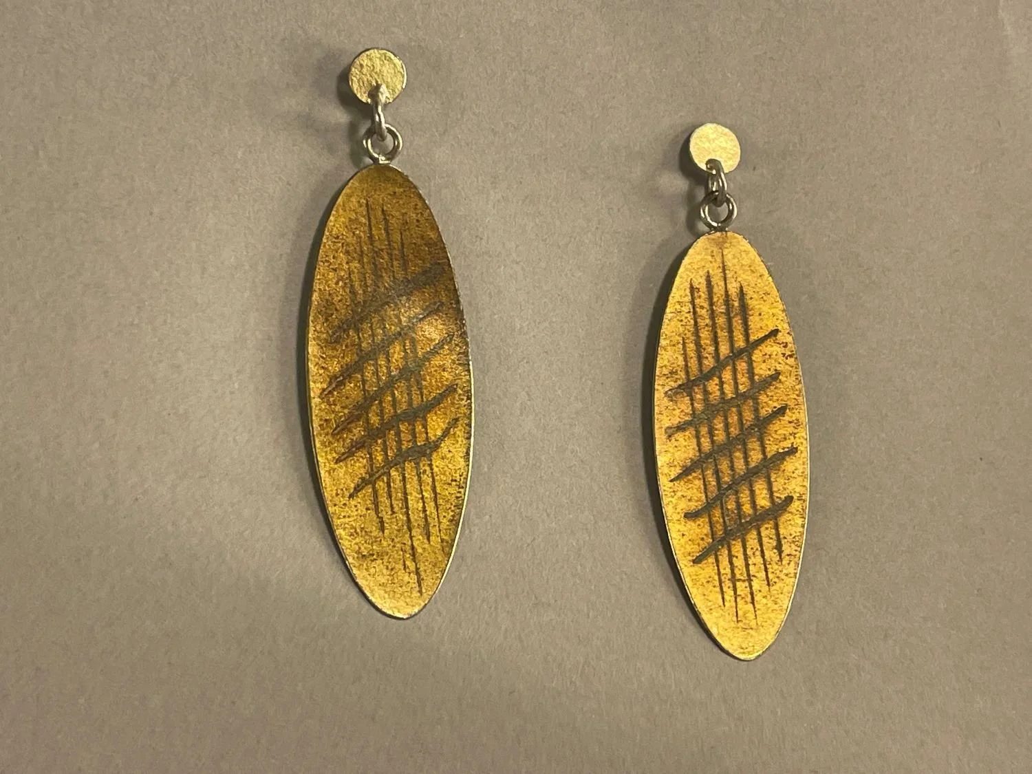 ‘Wattle’ Earrings (Swoop Series), 1980's, materials sterling 18k doublée, each (5 cm long), $160 Cdn.