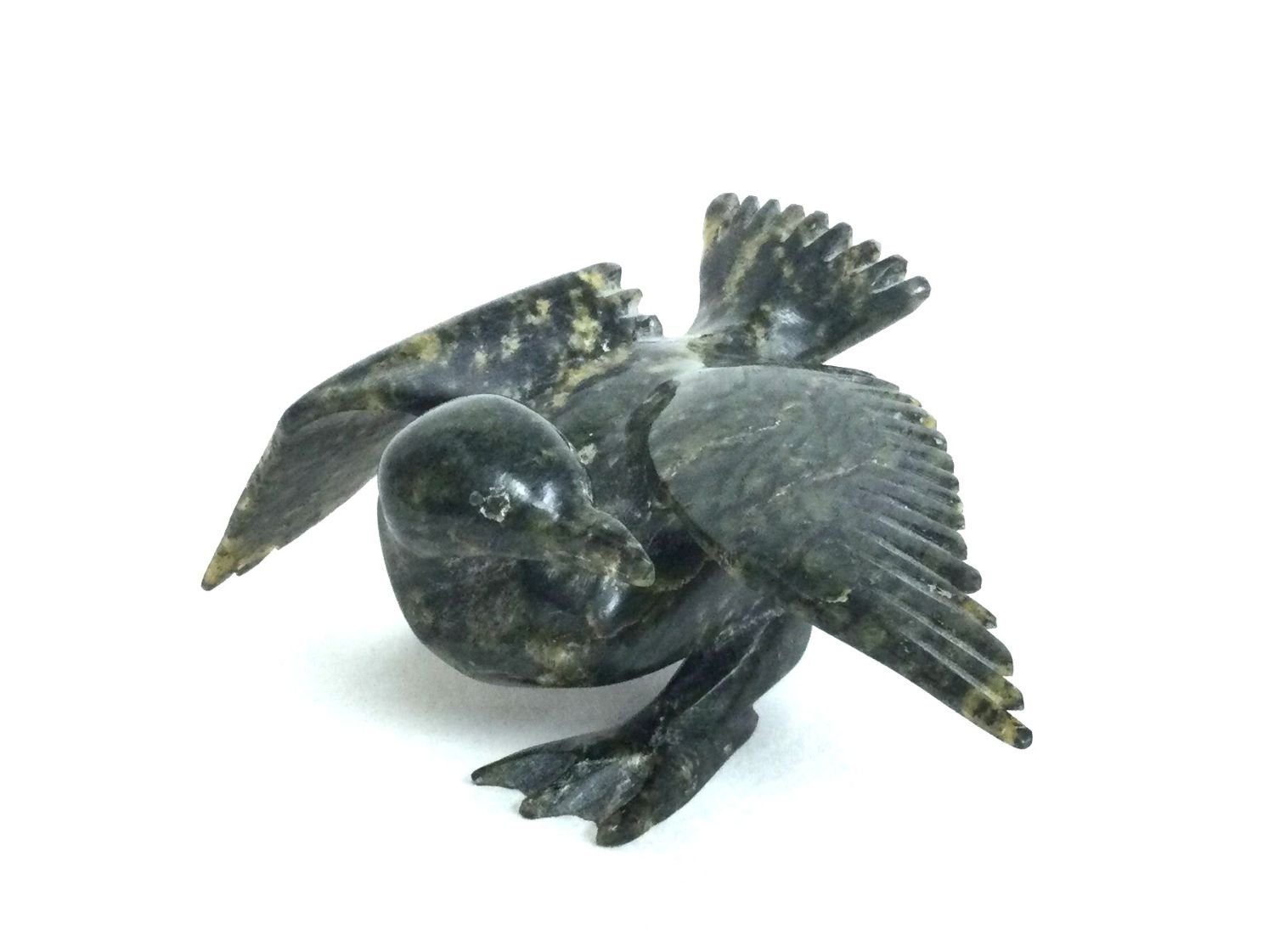 Napachie Sharky (E7-2729) ᓇᐸᓯ / ᓴᑭ (1971-2018) Cape Dorset/Kinngait, ᑭᙵᐃᑦ, Small Water Bird Protecting Its Nest (#25.8.5), c.2003, serpentine, 1.5 x 3 x 4.5 inches (4.5 x 8 x 12 cm), provenance: private collection Canmore, $550 Cdn