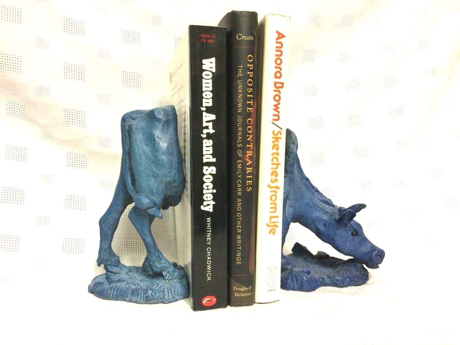 Cow Bookend (blue), bronze, edition 1/5, 6 x 4 x 8 inches (15 x 10 x 20 cm), two pieces, sold.