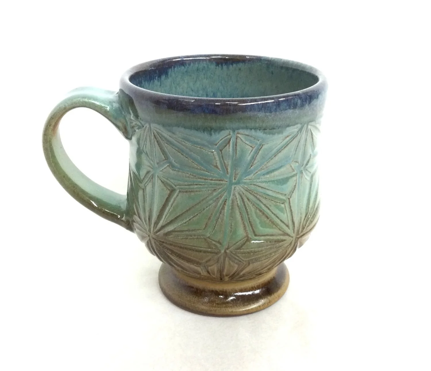 Kumiko Prairie Sky Mug hand carved and glazed stoneware (#24.12.17), 2024, 4.75 x 3.25 x 4" (12 x 8 x 10 cm) sold.