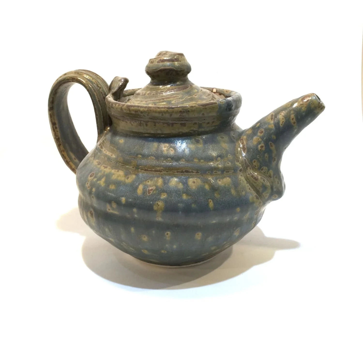 Reduction Fired Teapot (#26.6.25), 2026, reduction fired porcelain, 6 x 8 x 5.5 inches (15 x 20.5 x 14 cm), $120 Cdn.