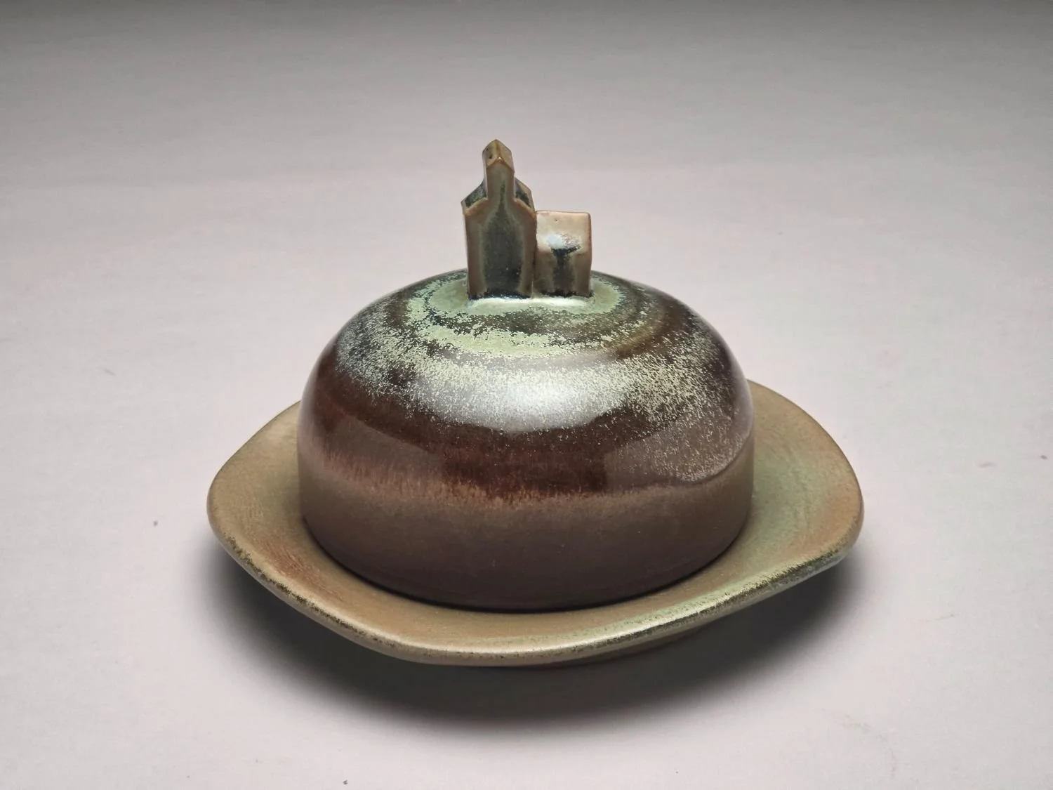 Blue Skies & Grain Elevator Butter Dish (#26.5.4c), 2026, glazed stoneware, 4.25 x 5.75 x 5.75 inches (11 x 14.5 x 14.5 cm), sold.