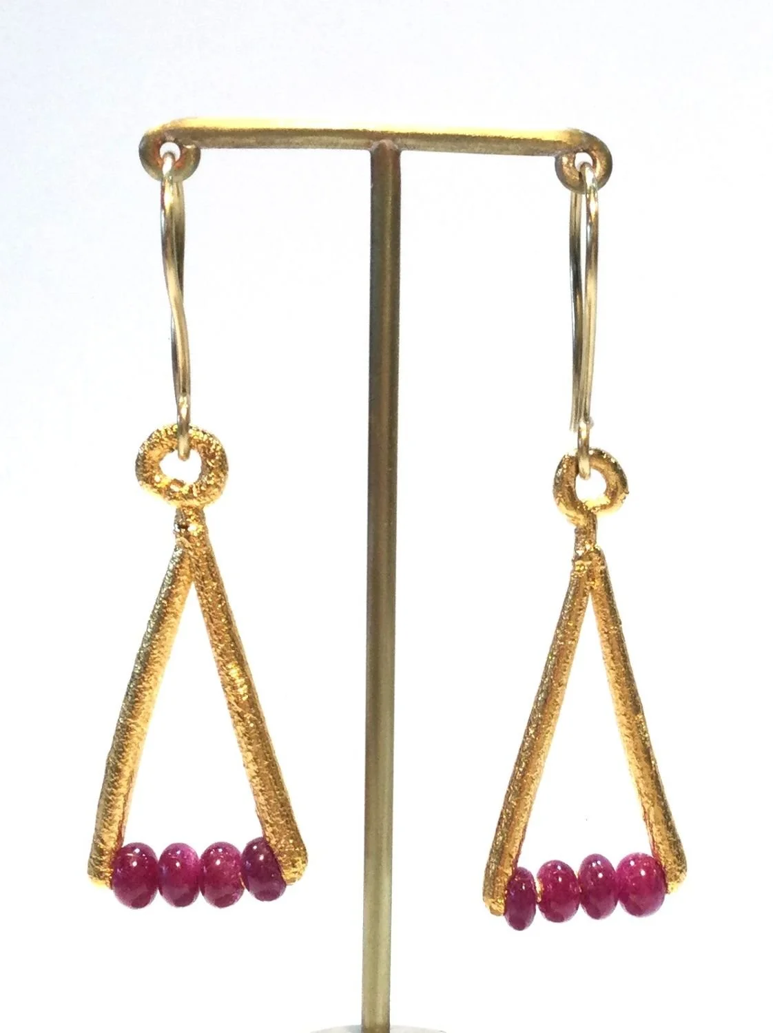 Fundus Cage Earring (#278), 2010, thick electroformed 24k gold, rubies, 18k gold ear wire, fusion welded stainless steel, electroformed copper, 2.25 x 1.5 inches (5.5 x 2 cm), $800 Cdn.
