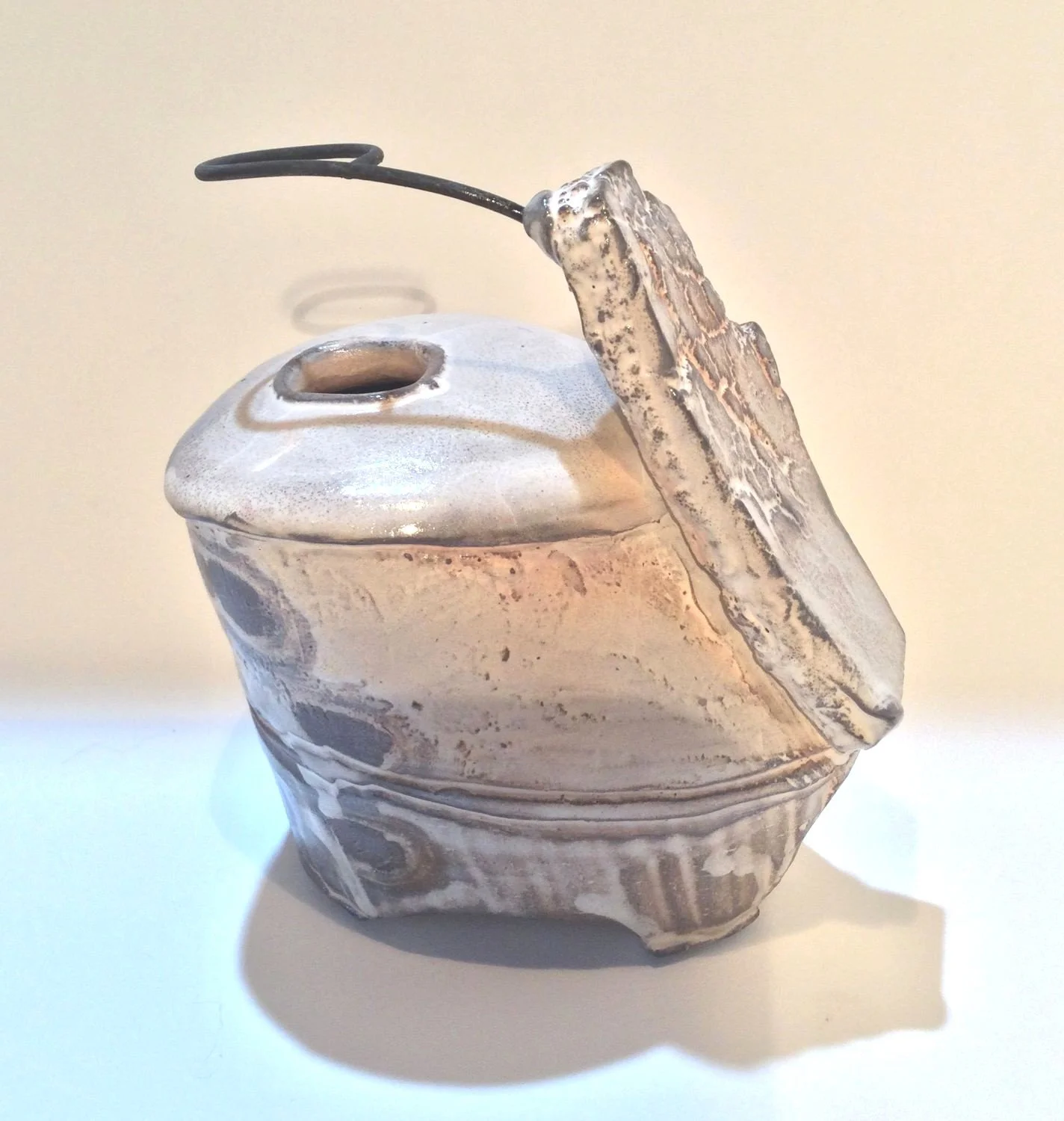 Confluence Bud Vase (#26.2.9), 2026, low soda fired earthenware, 4.5 x 3 x 4.5 inches (11 x 8 x 11.5 cm), $90 Cdn.