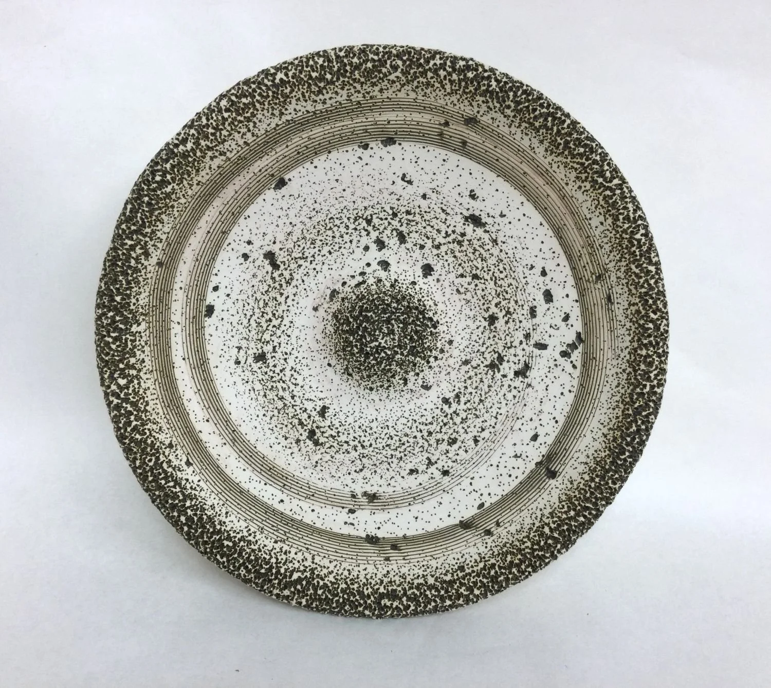 Bronze Flow Form (#25.9.6), 2023, earthenware clay, sepia glaze wall hanging, 12 x 3.5" (30.5 x 9 cm), $450 Cdn.