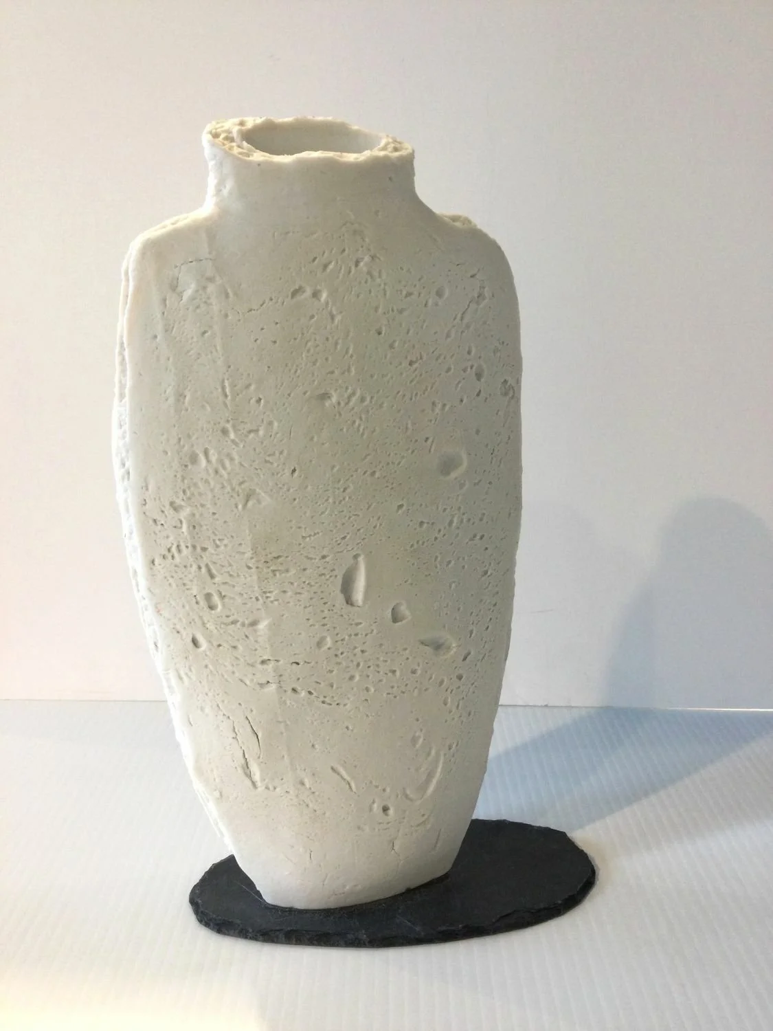 Snowy Mountain-XXVI-II, 1997/2025, porcelain slab with slate base, 12.75 x 6.25 x 2 inches (32 x 16 x 5 cm), $720 Cdn.