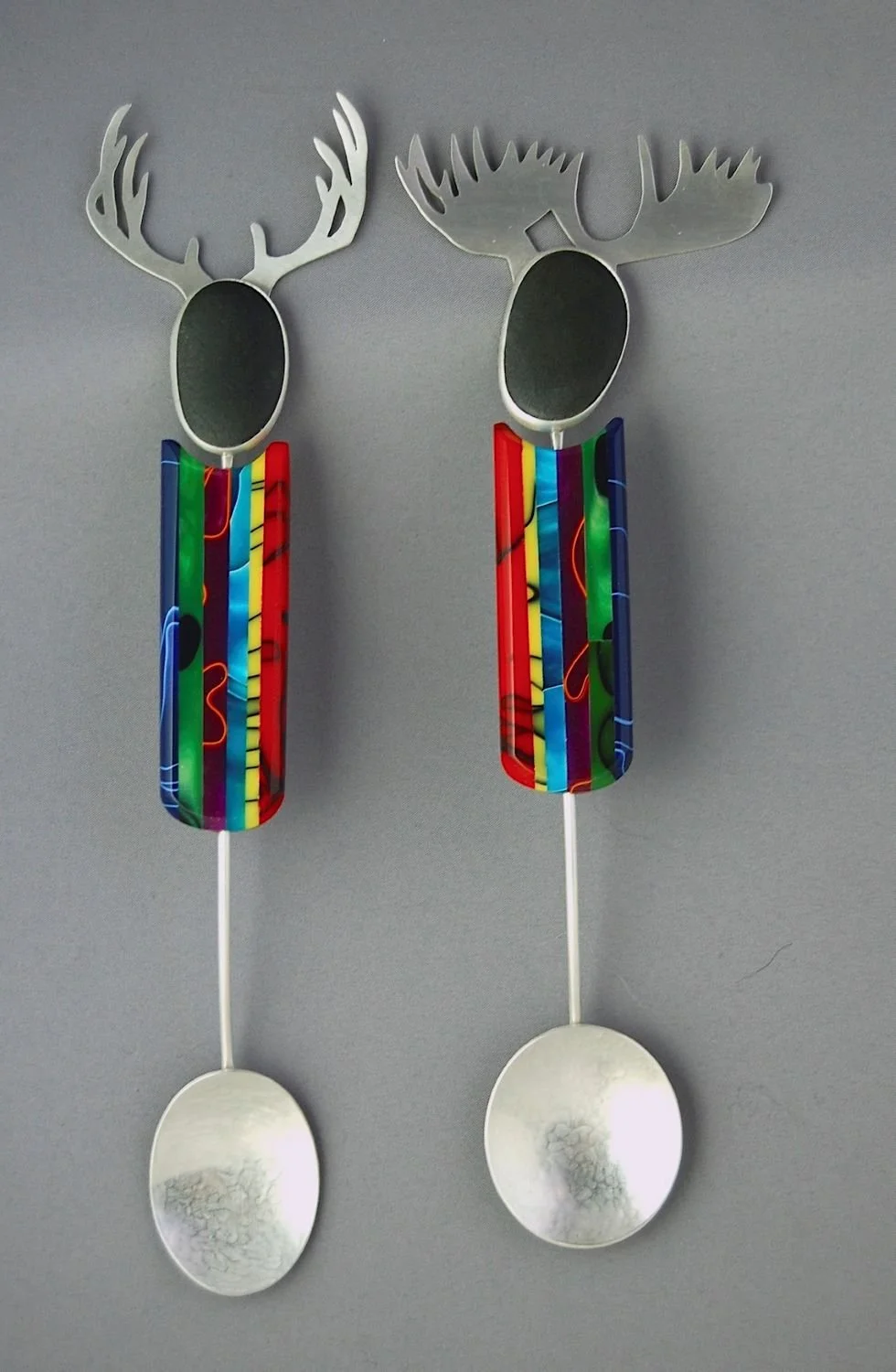 Moose Serving Spoon (#JDA9a) and Deer Serving Spoon (#JDA9b), c.2011, sterling, acrylic acetate, 7.25 x 2.5 x 5/8 inches (18.5 x 6.5 x 1.7 cm) and 7.75 x 1.75 x .75 inches (19.8 x 4.6 x 2 cm), $500 Cdn each.