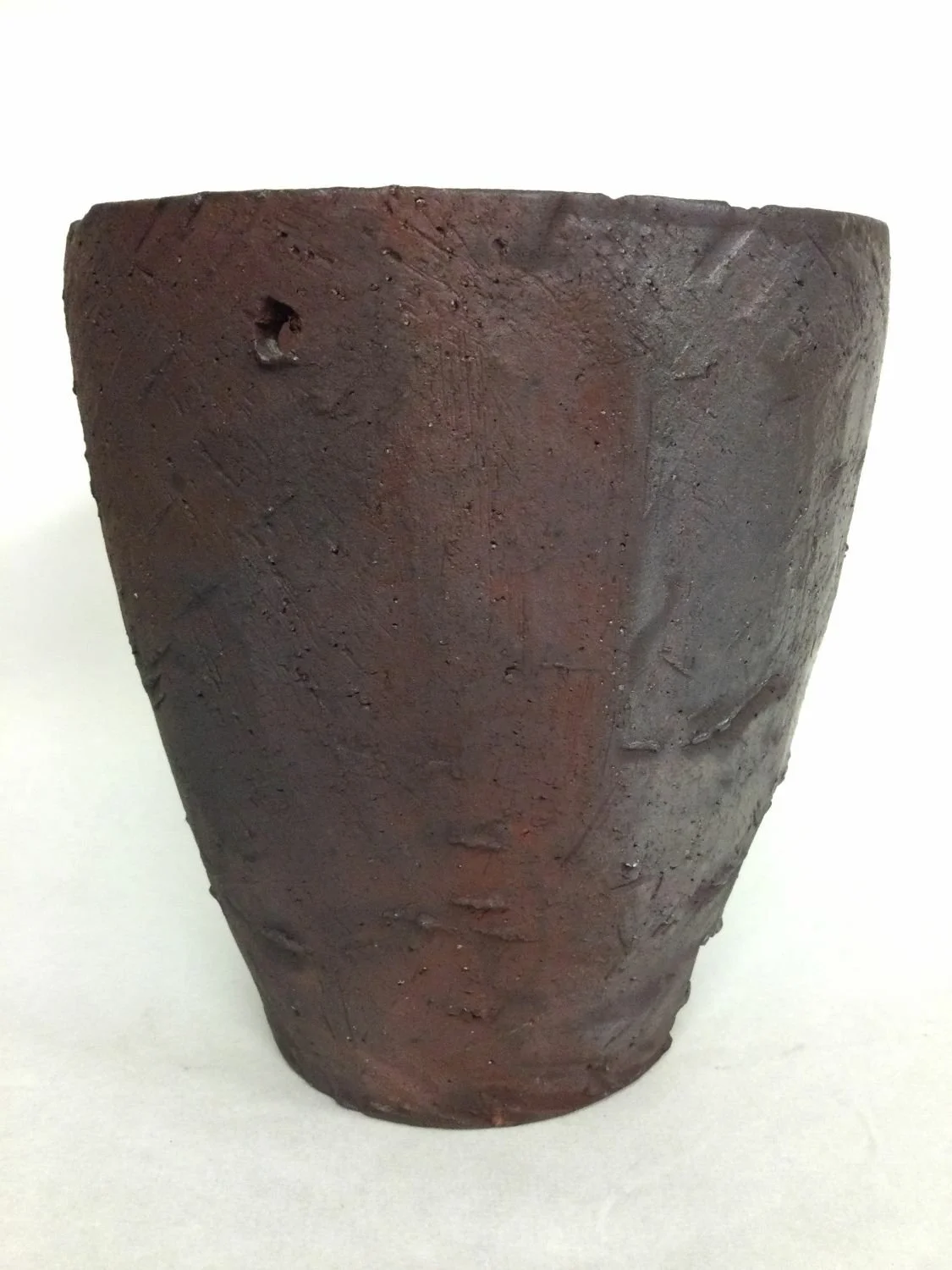 Reduction Cooled Crucible (#25.16), 2025, woodfired porcelain, 8.5 x 7.5 inches (21.5 x 19 cm) $295 Cdn.