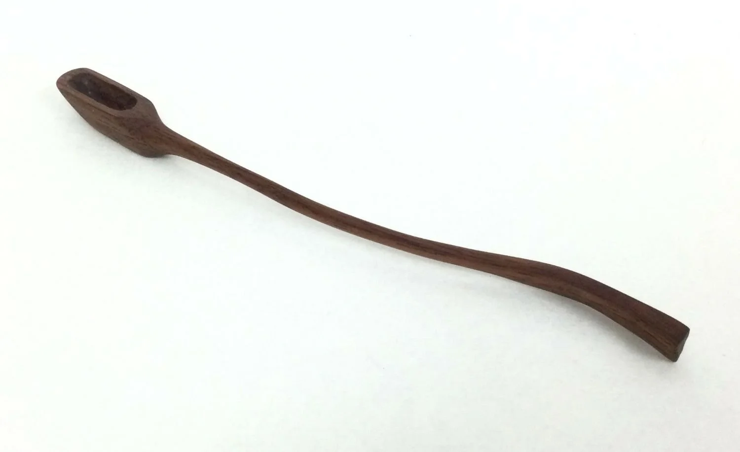 Smooth Curve Small Spoon (#25.12.17), 2025, hand carved & sanded walnut, 5.75 x .25 x .25 inches (14.5 x .5 x .5 cm), $24.95 Cdn.