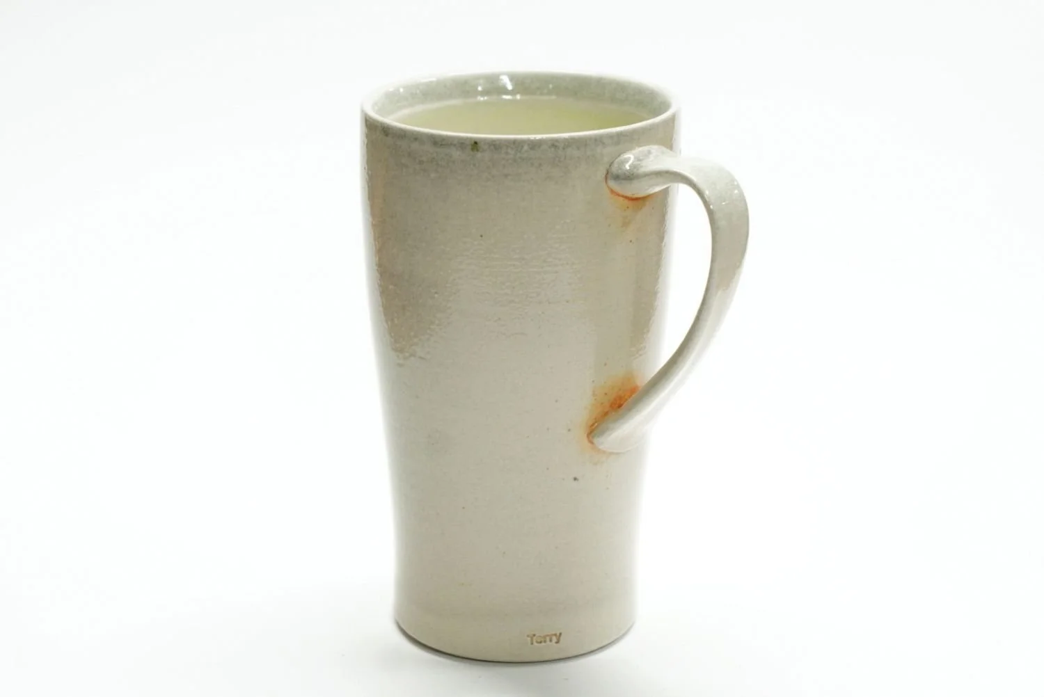 Tall Soda Fired Mug (#25.57), soda fired porcelain, 6 x 4.75 x 3.50 inches (15.5 x 12 x 9cm), $55 Cdn.