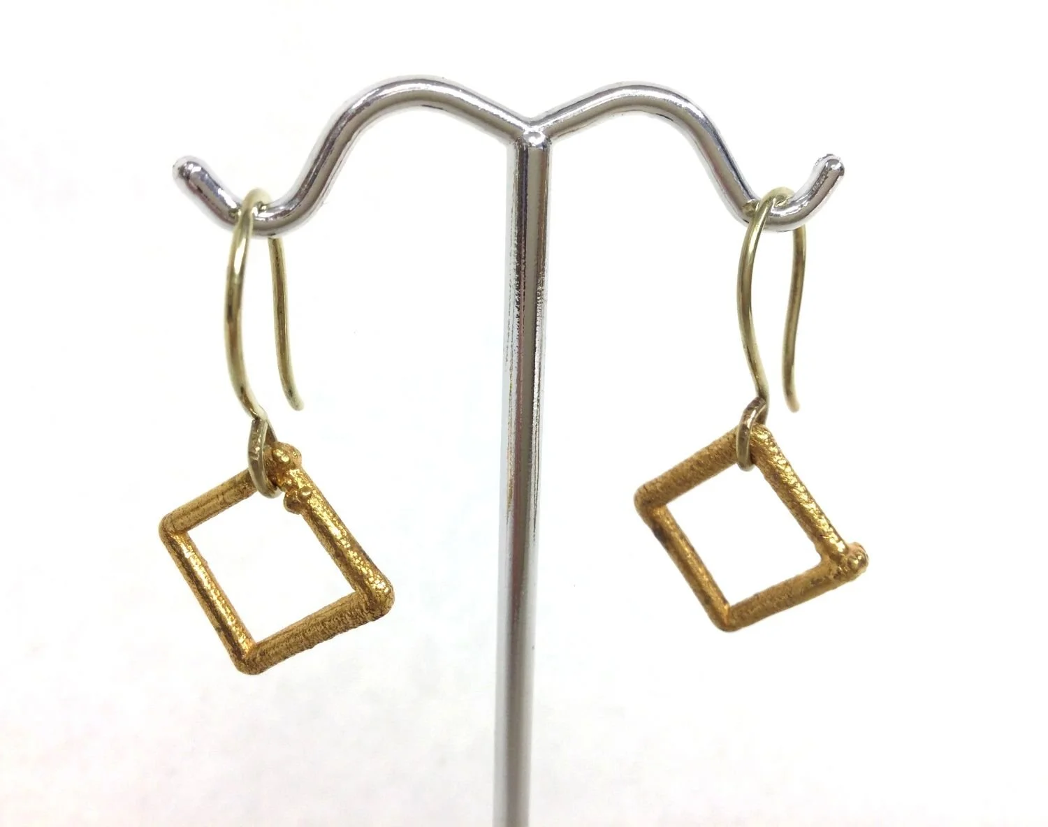 Little Squares Cage Earrings (#244), 2012, 24K gold electroforming, fusion welded stainless steel, electroformed copper, .75 x .75 inches (1.7 x 1.6 cm), $420 Cdn.