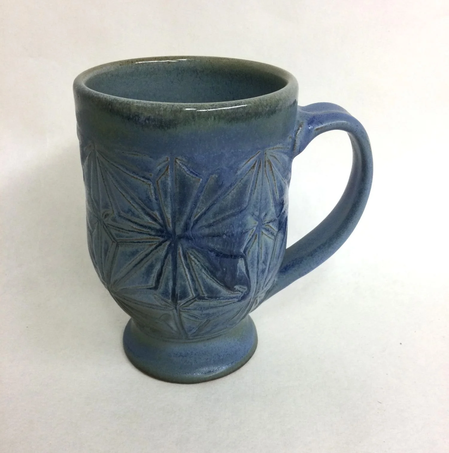 Kumiko Blue Sky Mug (#25.9.7), handcarved stoneware, 5 x 3.5 x 5 inches (13 x 9 x 13 cm), $50 Cdn.
