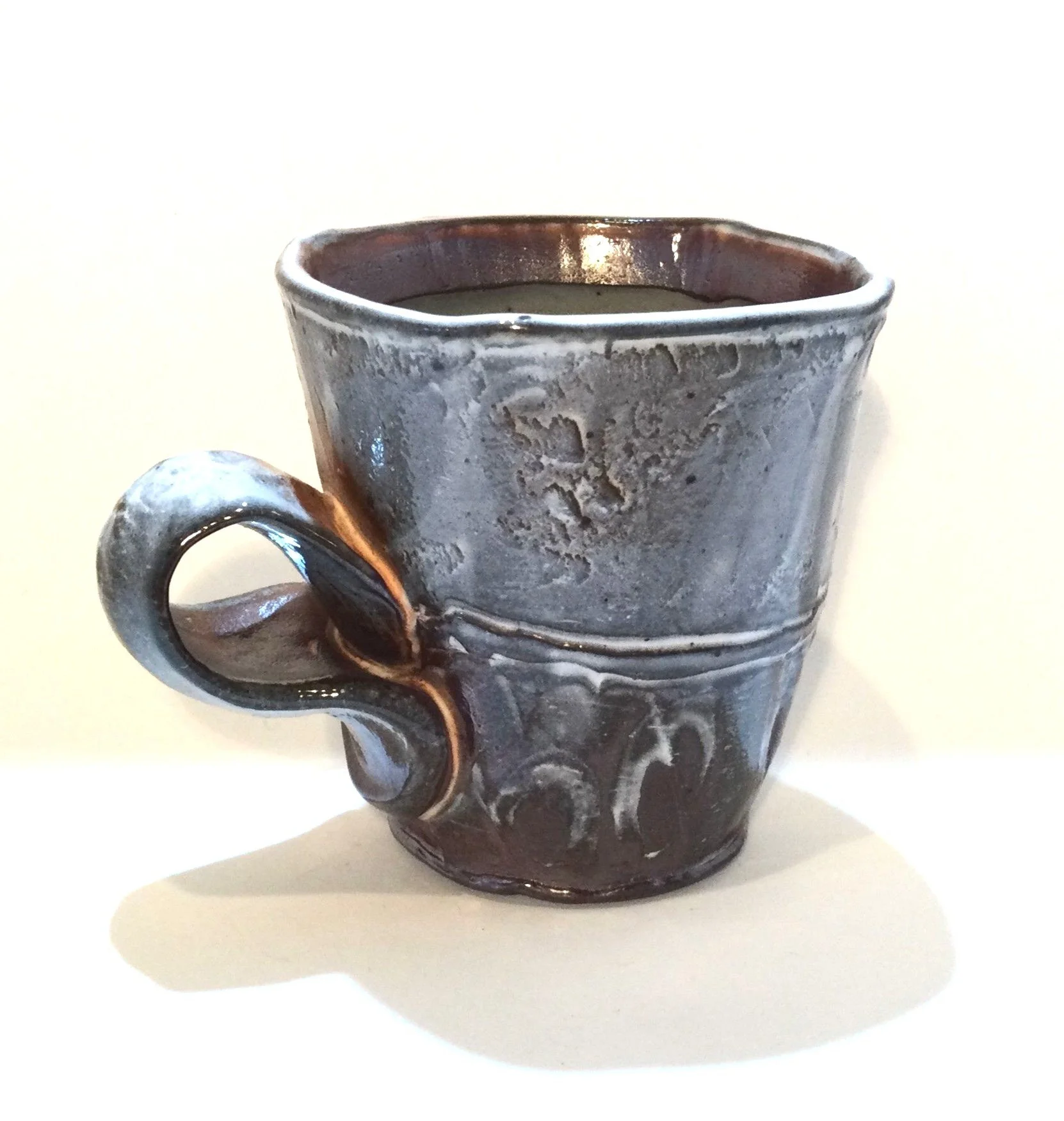 Confluence - Espresso Mug (#26.2.72), 2026, low soda-fired earthenware, 3.25 x 4.25 x 3.25 inches (8.5 x 11 x 8 cm), $60 Cdn.