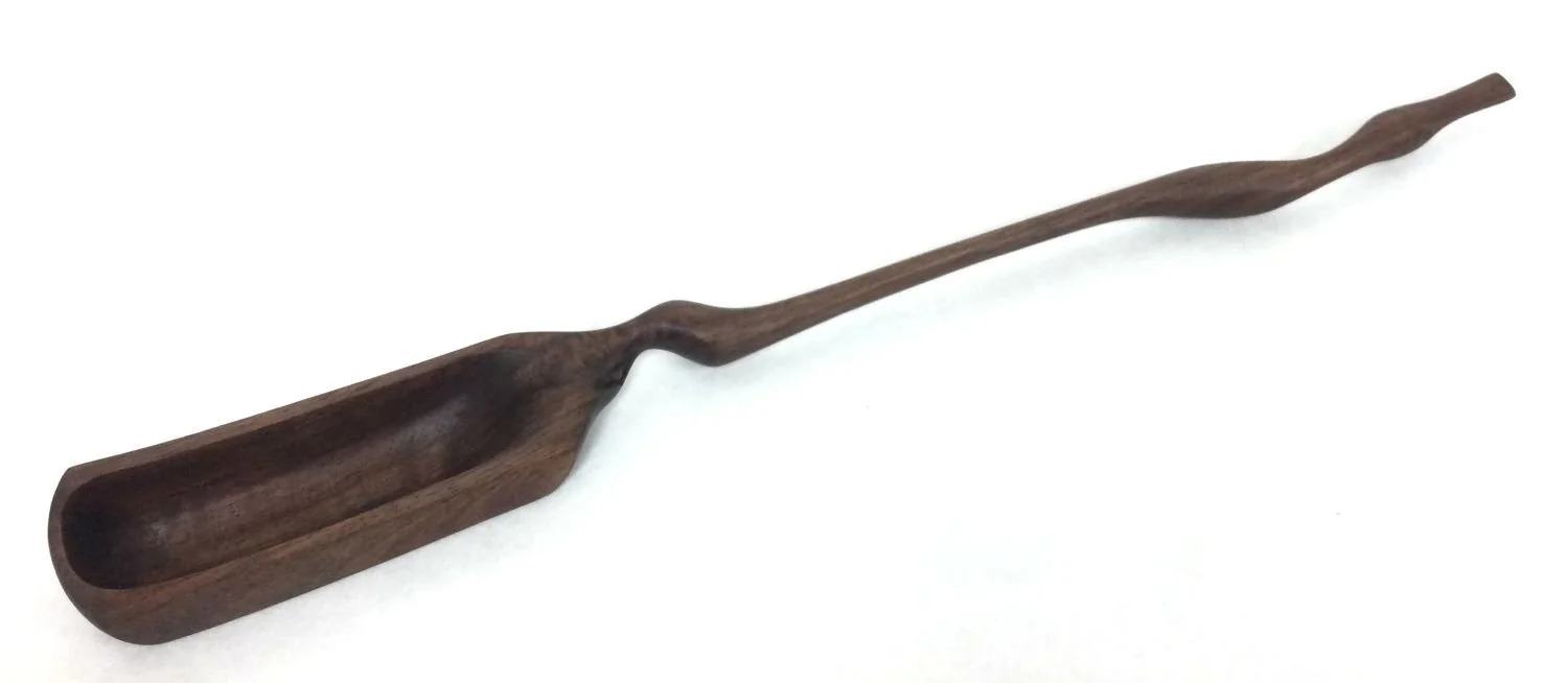 Mountain Cascade X-Large Spoon (#25.12.28), 2025, chiseled and hand sanded walnut, 13.5 x 1.25 x .75 inches (34.5 x 3 x 2 cm), $149 Cdn.