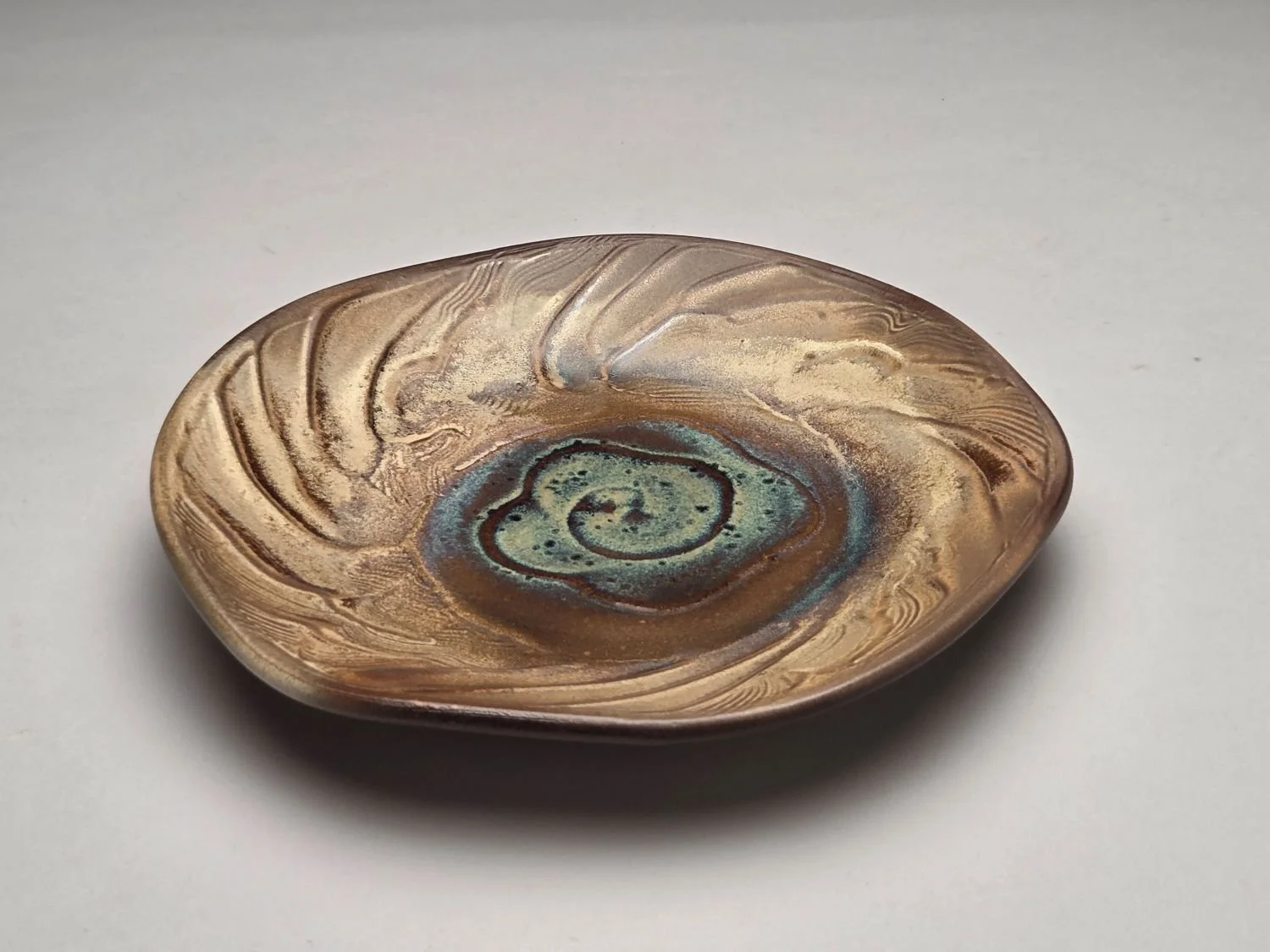 Prairie Waters Plate (#26.5.10), 2026, glazed stoneware, 1 x 7.75 x 7.75 inches (2.5 x 19 x 19 cm), $70 Cdn.