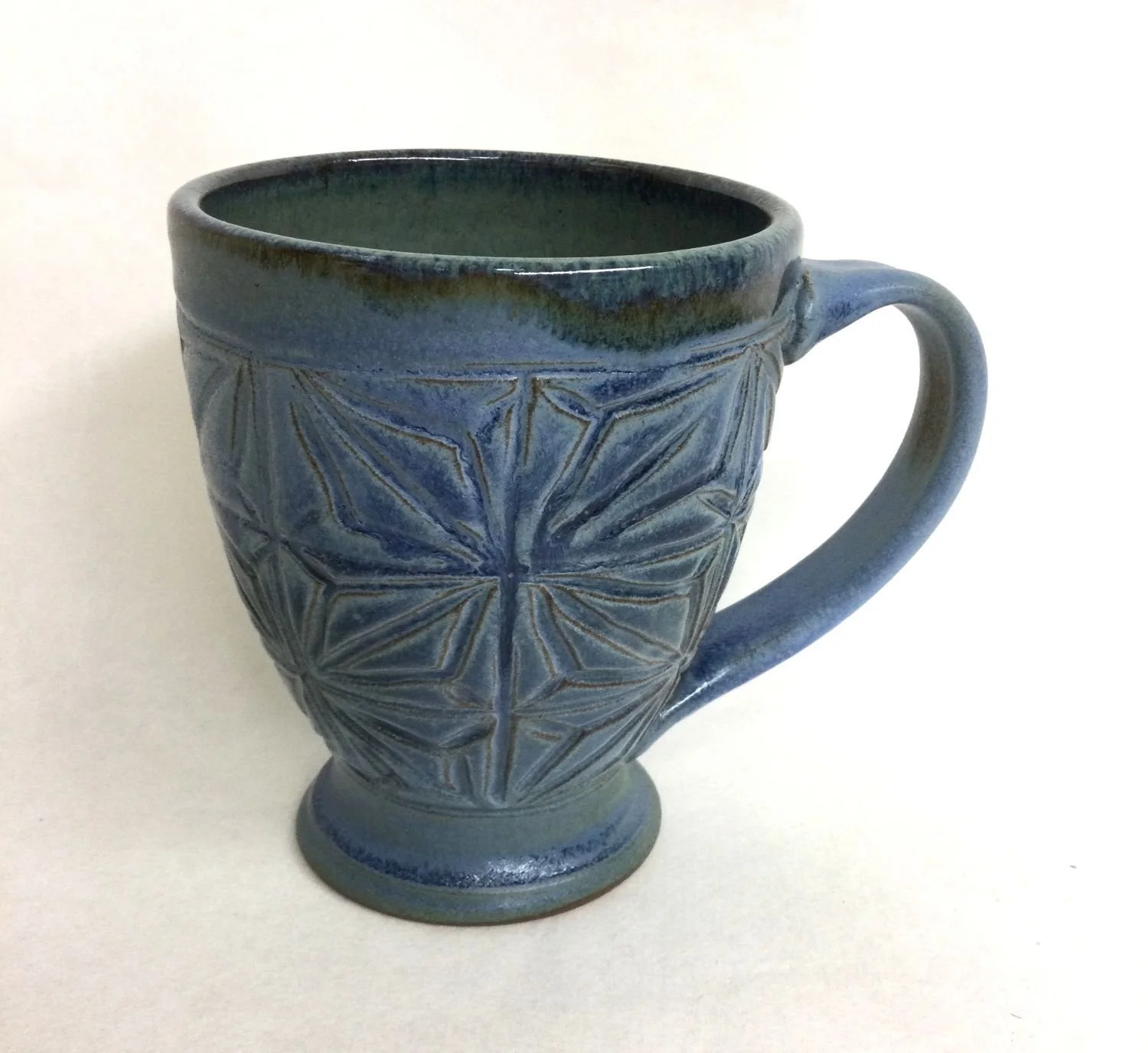 Kumiko Blue Sky Mug (#25.9.9), handcarved stoneware, 5 x 3.5 x 5 inches (13 x 9 x 13 cm), $50 Cdn.