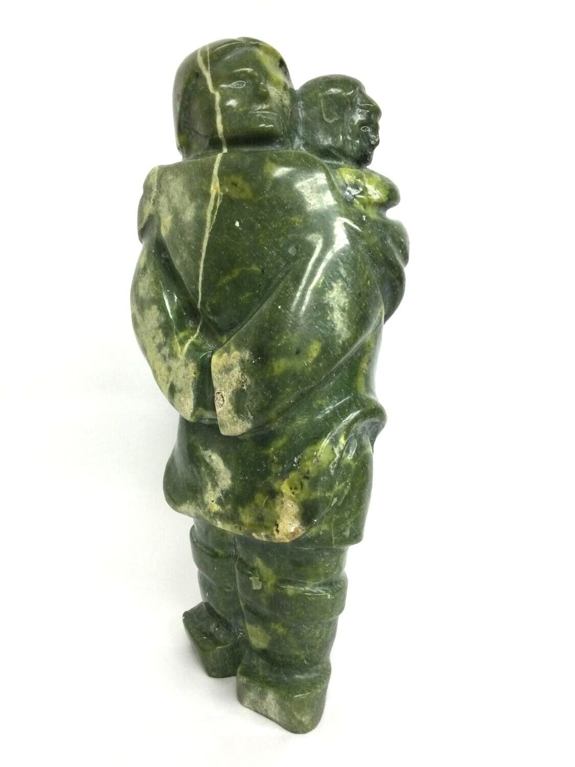 Iziasie Kopalie (E6-567) 1948- Qikiqtarjuaq / Broughton Island, ᕿᑭᖅᑕᕐᔪᐊᖅ, Mother And Child (#25.6.28), 1976, green serpentine, 12 x 5.25 x 4 inches (30.5 x 13 x 10 cm), provenance: Saskatchewan Collection, $850 Cdn.