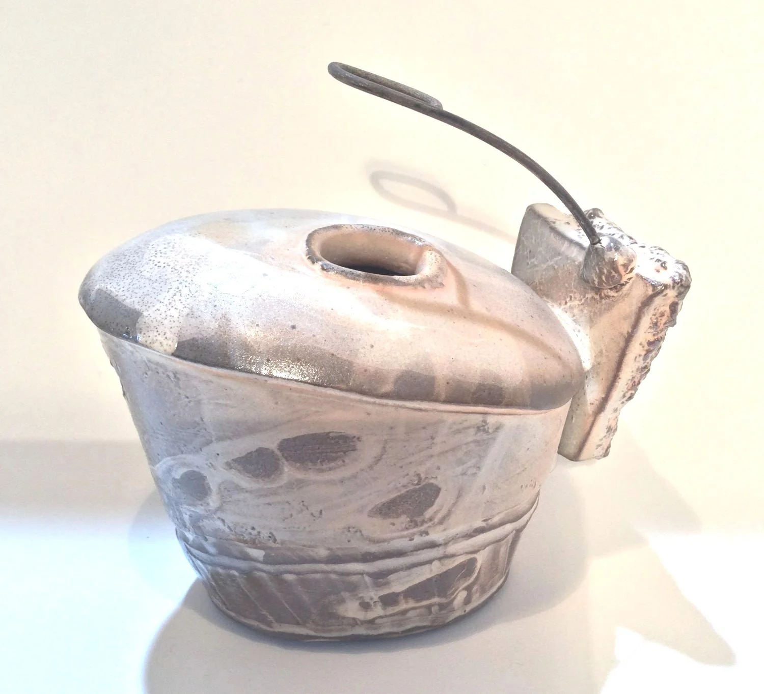 Confluence Bud Vase (#26.2.7), 2026, low soda fired earthenware, 3 x 3.5 x 4.75 inches (8 x 8.5 x 12 cm) sold.