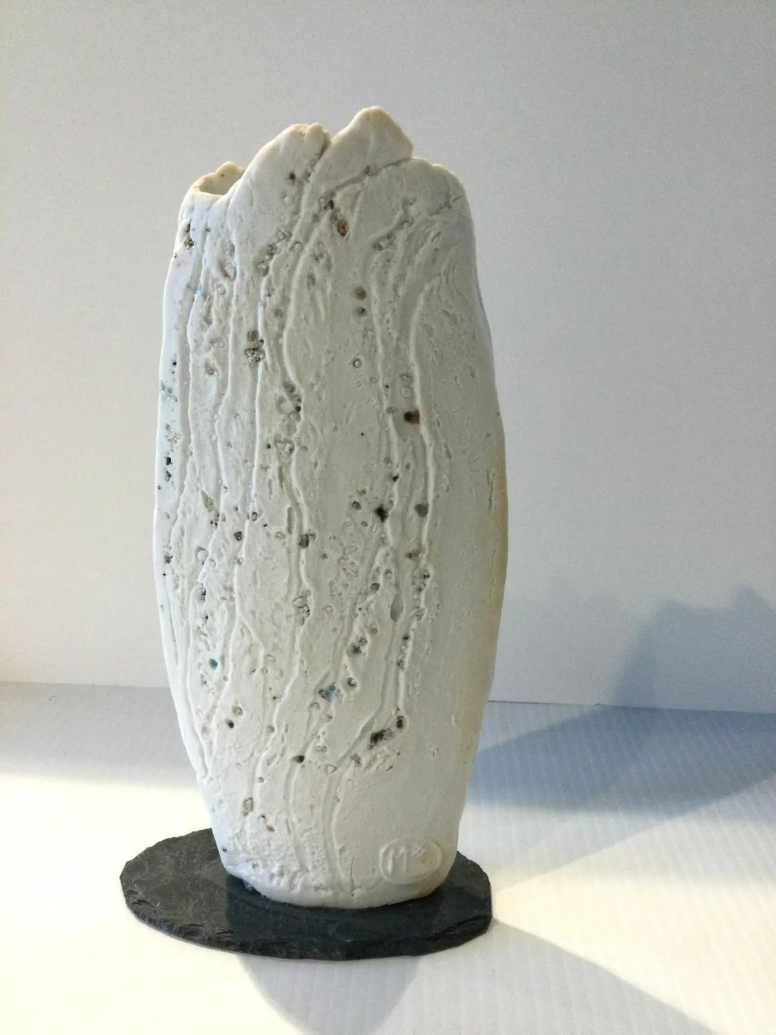Snowy Mountain-Glacial Till XXVI-III, 2025, porcelain slab with slate base, 10.25 x 4.75 x 2 inches (26 x 12 x 5 cm), $480 Cdn.