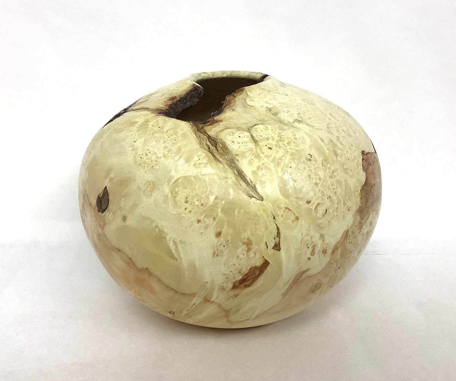 Natural Edge Box Elder Burl Vase (V160), 2024, turned, natural red highlights, 4.5 x 5.25 inches (11.5 x 13.5 cm), $400 Cdn.