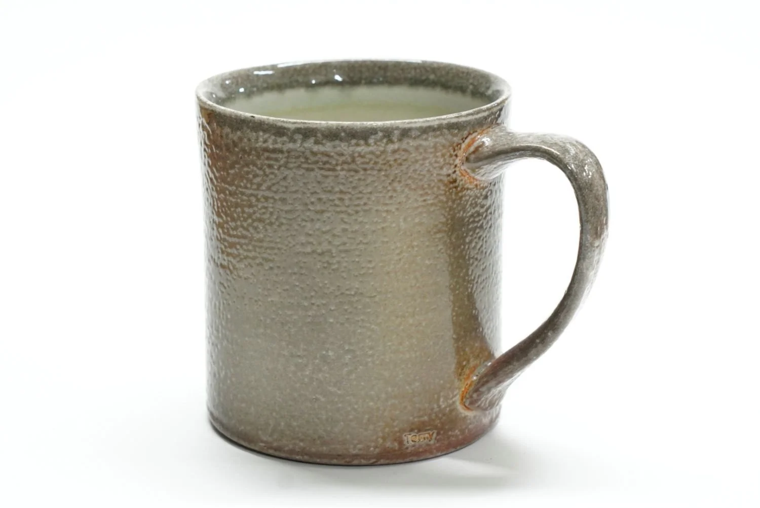 Soda-Fired Mug (#25.40), 2025, soda fired porcelain, 4 x 5.25 x 3.5" (10 x 13 x 9cm) $50 Cdn