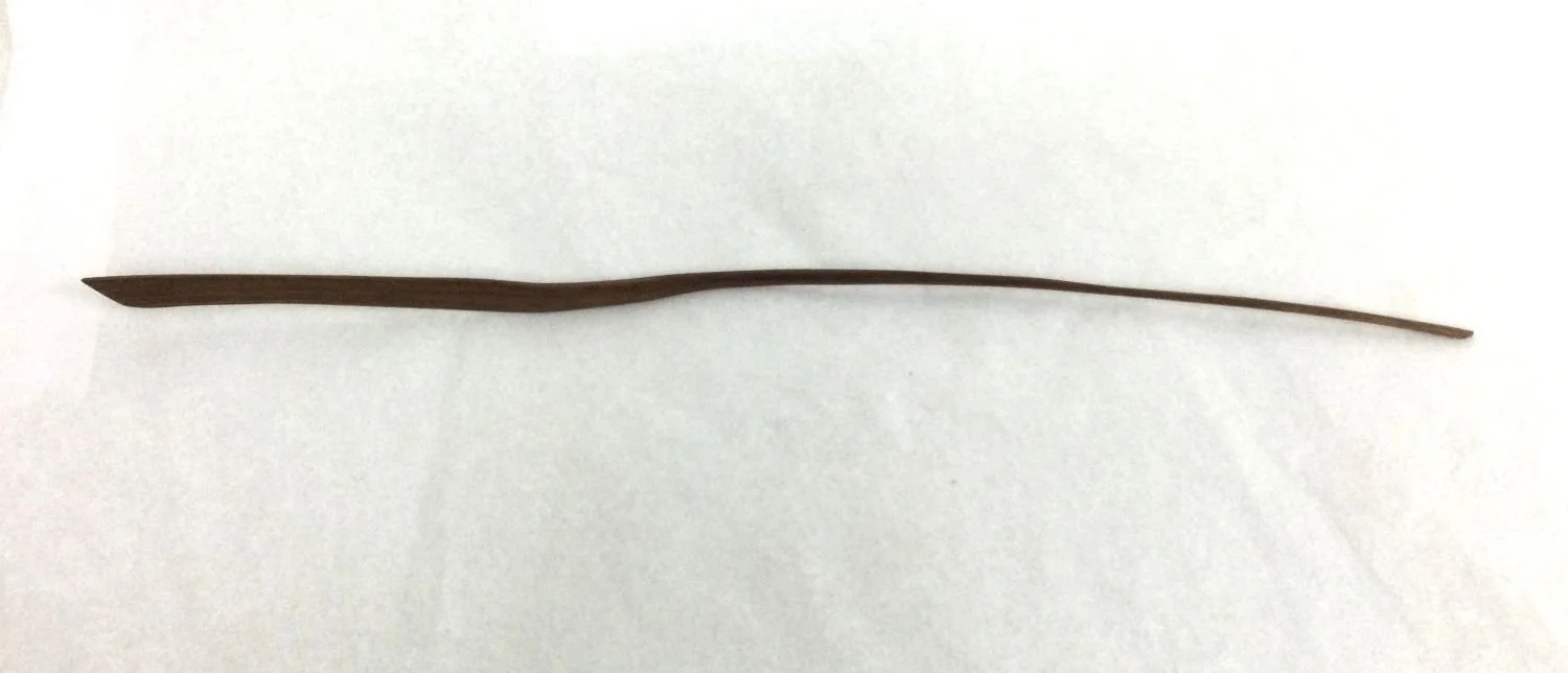 Long Handled Butter Knife (#25.2.8), 2025, chiselled and hand sanded walnut, 14.5 x .5 inches (37 x 1.5 cm), $95 Cdn.