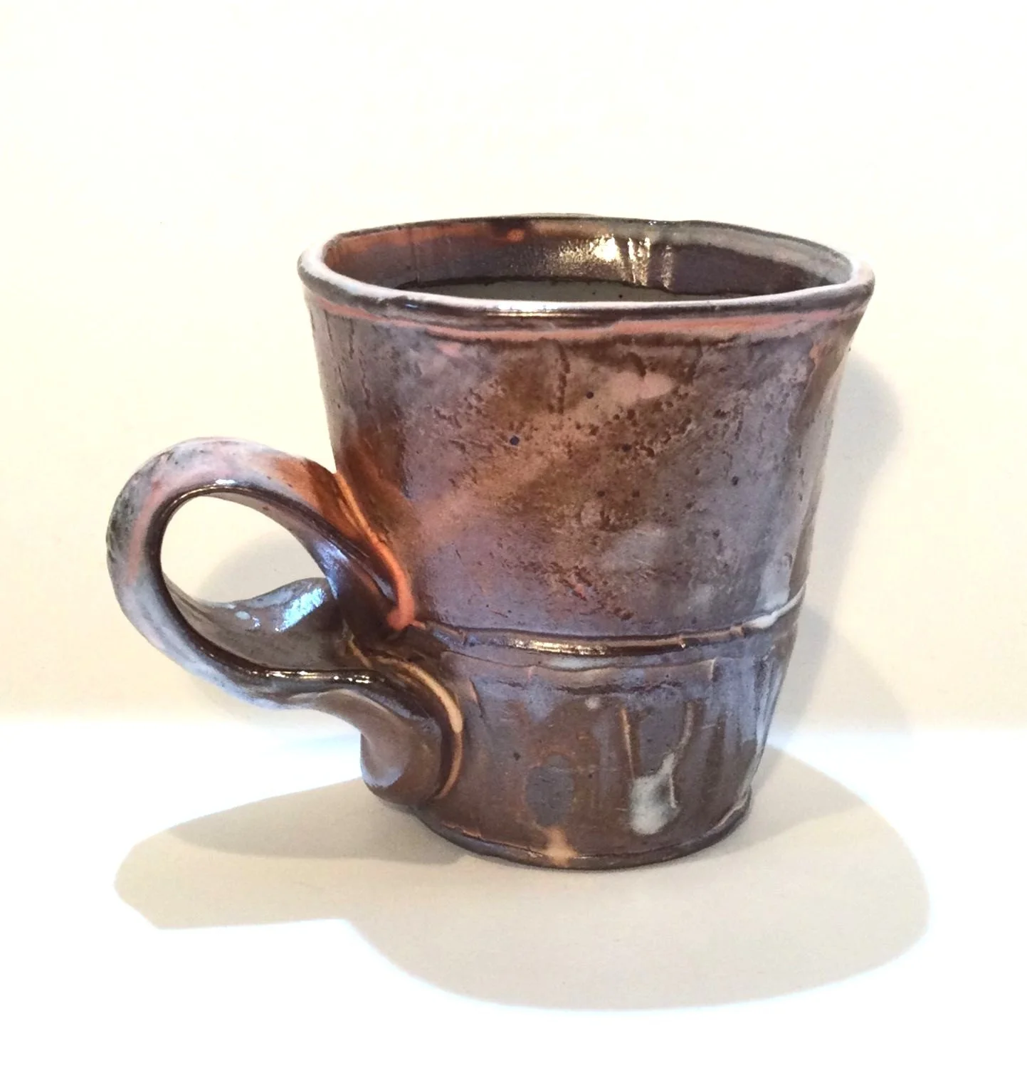 Confluence - Espresso Mug (#26.2.69), 2026, low soda-fired earthenware, 3.25 x 4.25 x 3.25 inches (8.5 x 11 x 8 cm), $60 Cdn.