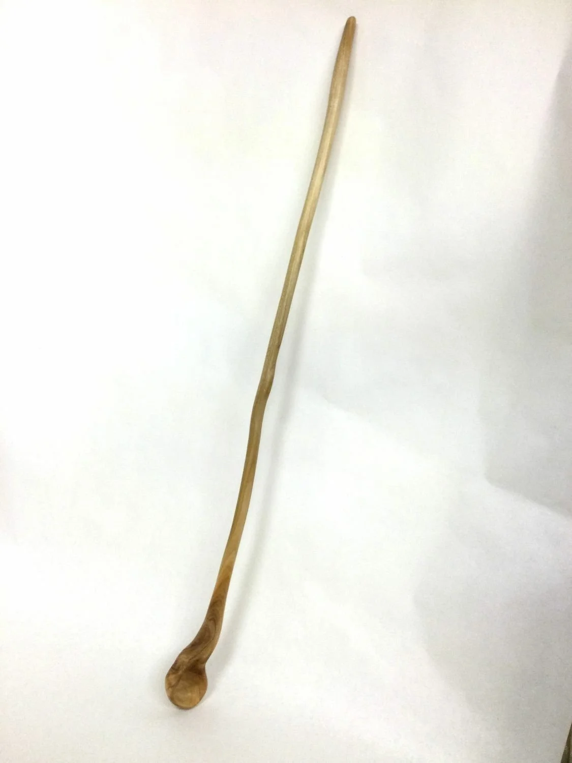 Long Handled Knotted Bowl Spoon (#25.9.2), 2025, hand carved & sanded cherry, 28.75 x 1.25 x 2 inches (73 x 3 x 5 cm), $195 Cdn.
