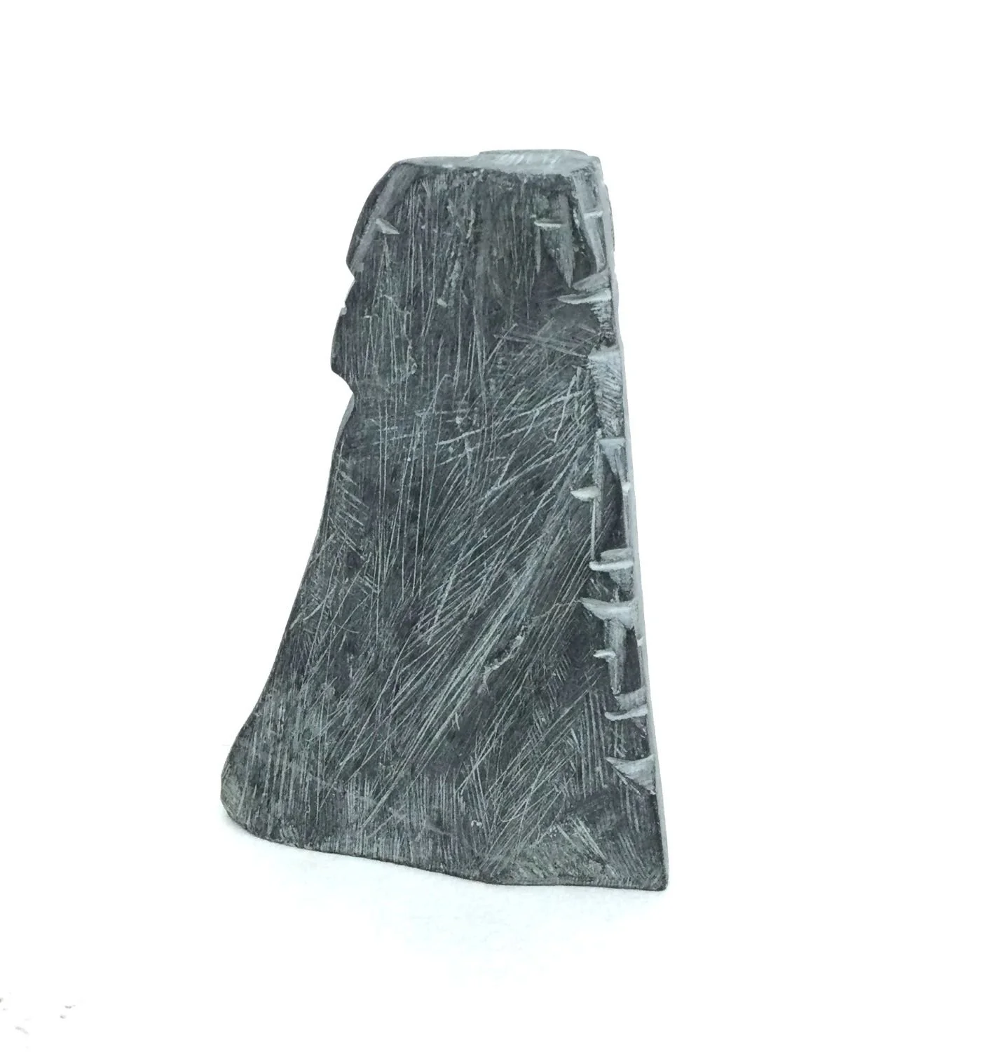 Lucy Tasseor Tutsweetok ᓗᓯ ᑕᓯᐅ ᑎᓯᑕ (1934-2012) Arviat/Eskimo Point ᐊᕐᕕᐊᑦ, Family Group (#25.8.7), c.1975, argillite, 5 x 4 x 1.5 inches (13.5 x 9 x 1.5cm), provenance: Canmore Collection, $1700 Cdn.