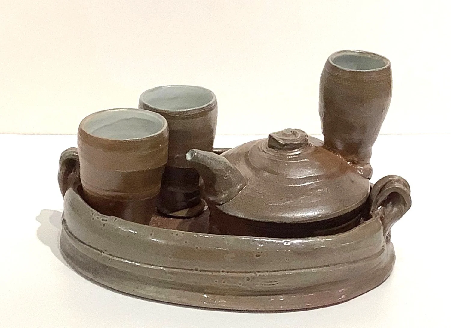 Porcelain Saki Set (4 pieces) (#24.11.62), 2024, 8 x 5.75 x 5.75 inches (20 x 14.5 x 14.5 cm), $110 Cdn.