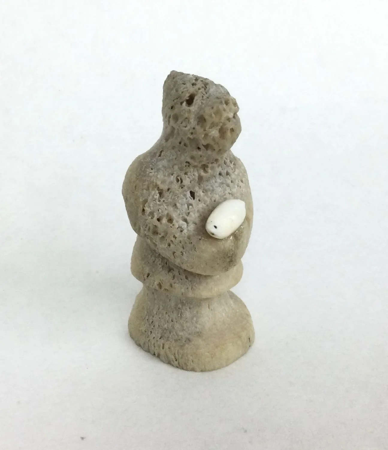 Unknown Inuit Artist, Small Figure with Ivory Bird (#26.8.9M), whalebone & ivory, 2.75 x 1 x 1 inches (7 x 2.5 x 2.5 cm), provenance: private collection Saskatchewan, $200 Cdn.---- note - export restrictions may apply.