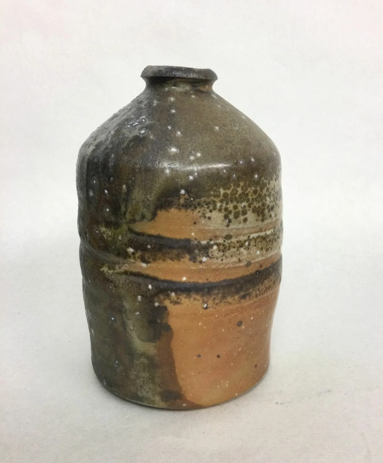 Atmospheric Fired Bottle (#25.12), 2025, woodfired porcelain, 5.75 x 3.5 inches (14.5 x 8.5 cm) $195 Cdn.