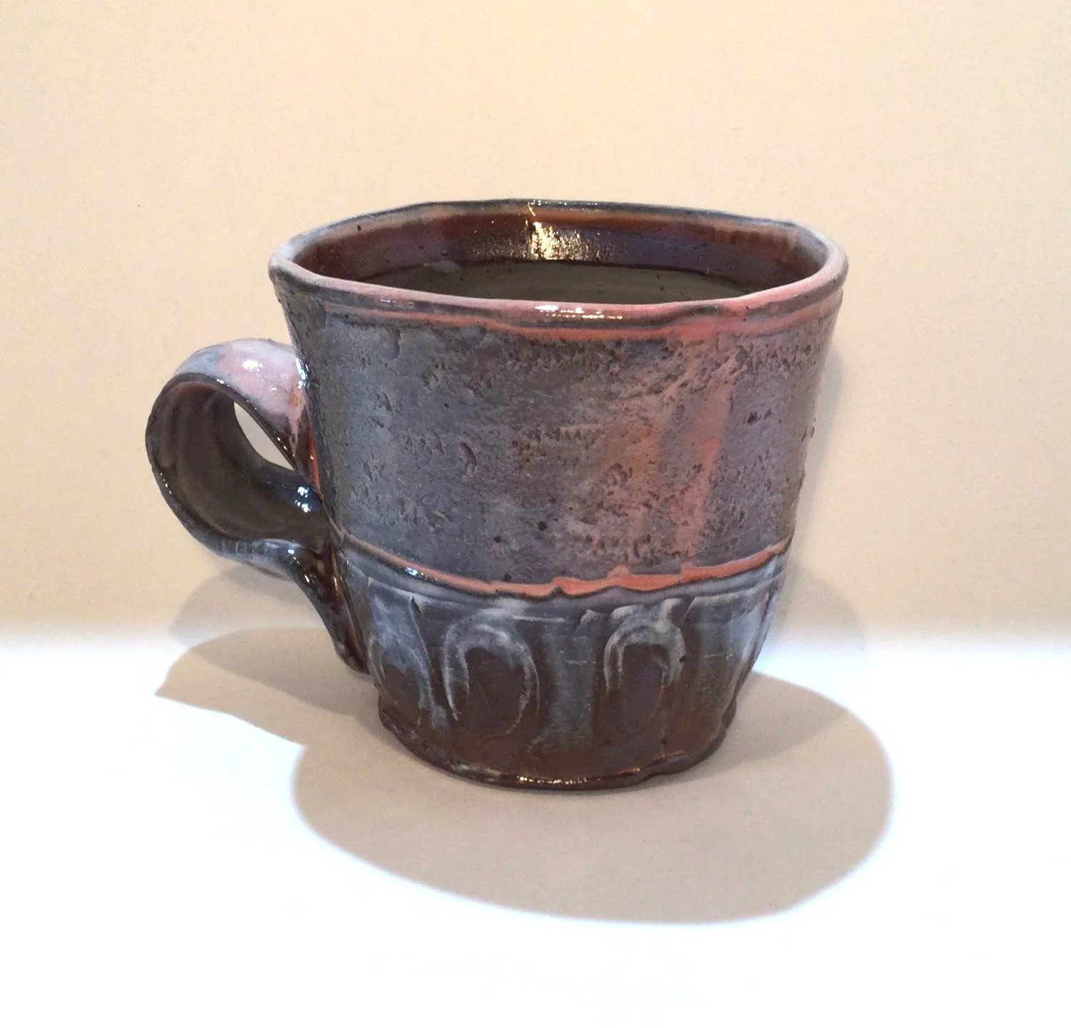 Confluence - Espresso Mug (#26.2.74), 2026, low soda-fired earthenware, 3.25 x 4.25 x 3.25 inches (8.5 x 11 x 8 cm), $60 Cdn.