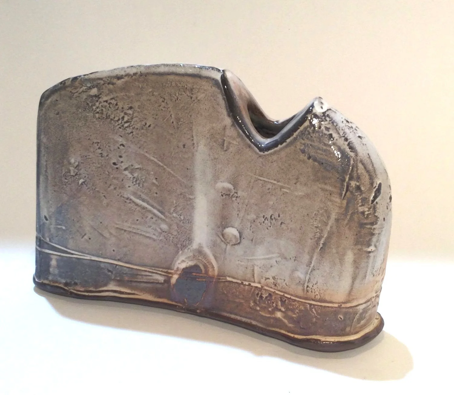 Small Angular Confluence Vase (#26.2.19), 2026, low soda fired earthenware, 4 x 5 x1.25 inches (10 x 13 x 3 cm), $90 Cdn.