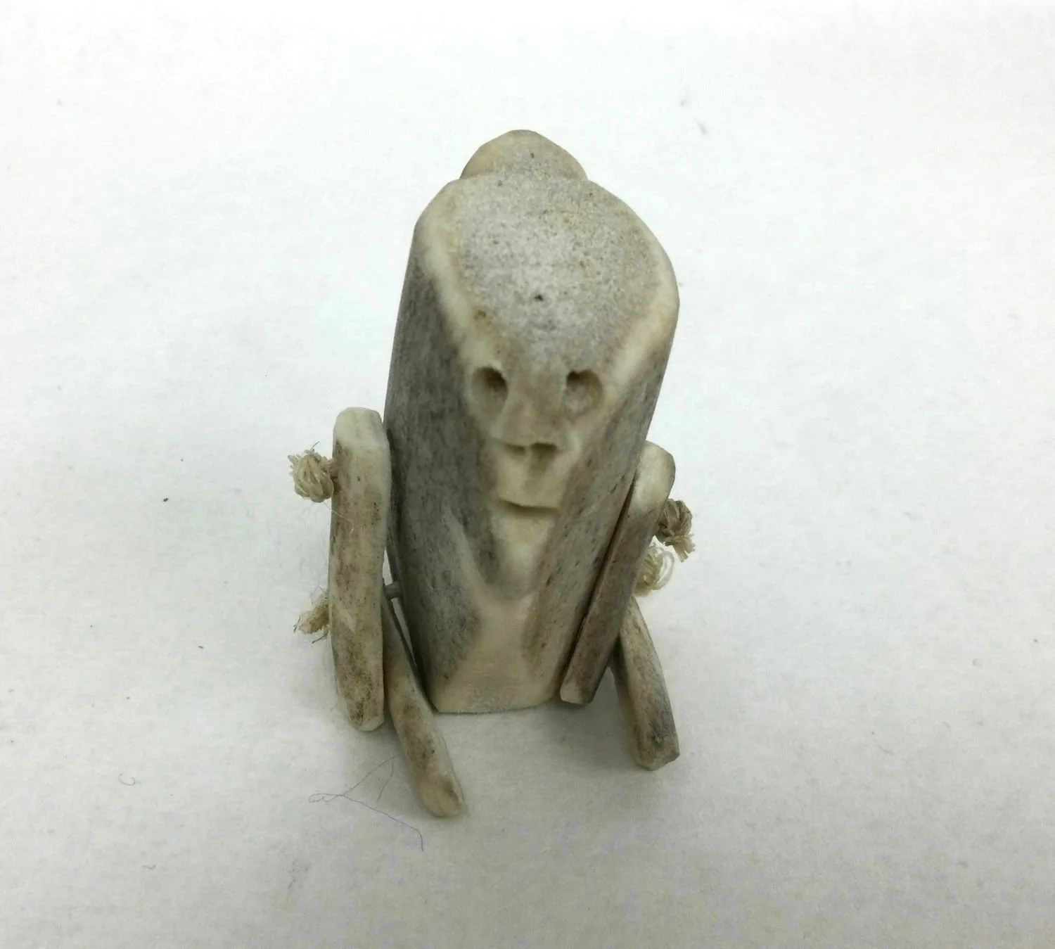 Luke Anowtalik (E1-524) ᓗ ᐊᓇᐅᑕᓕ (1932-2006) Arviat/Eskimo Point ᐊᕐᕕᐊᑦ, Antler Figure (#25.9.14), c.1980, carved antler, sinew, 2 x 1.5 x 1 inches (5 x 3.5 x 2.5 cm), provenance: BC collection, $325 Cdn  ---- note - export restrictions apply.